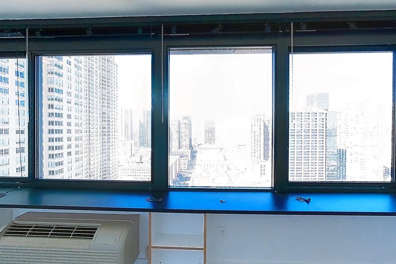 Living room with air conditioning and city view, Apartment SAB-2807 at Sable