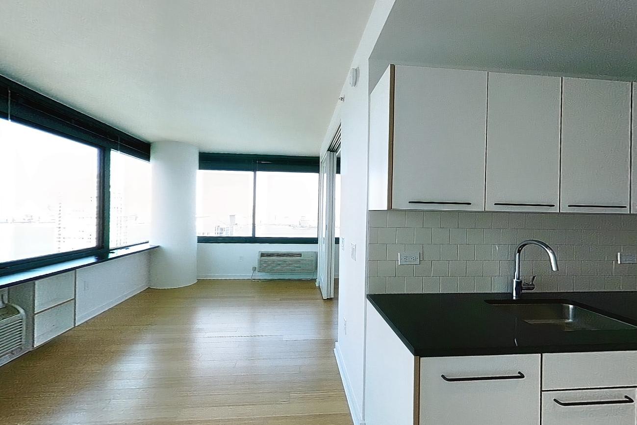 Kitchen with air conditioning, city view, and dark wood-finish flooring, Apartment SAB-3302 at Sable