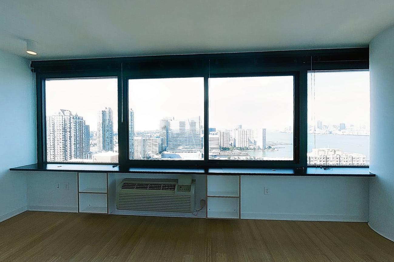 Living room with air conditioning and city view, Apartment SAB-3302 at Sable