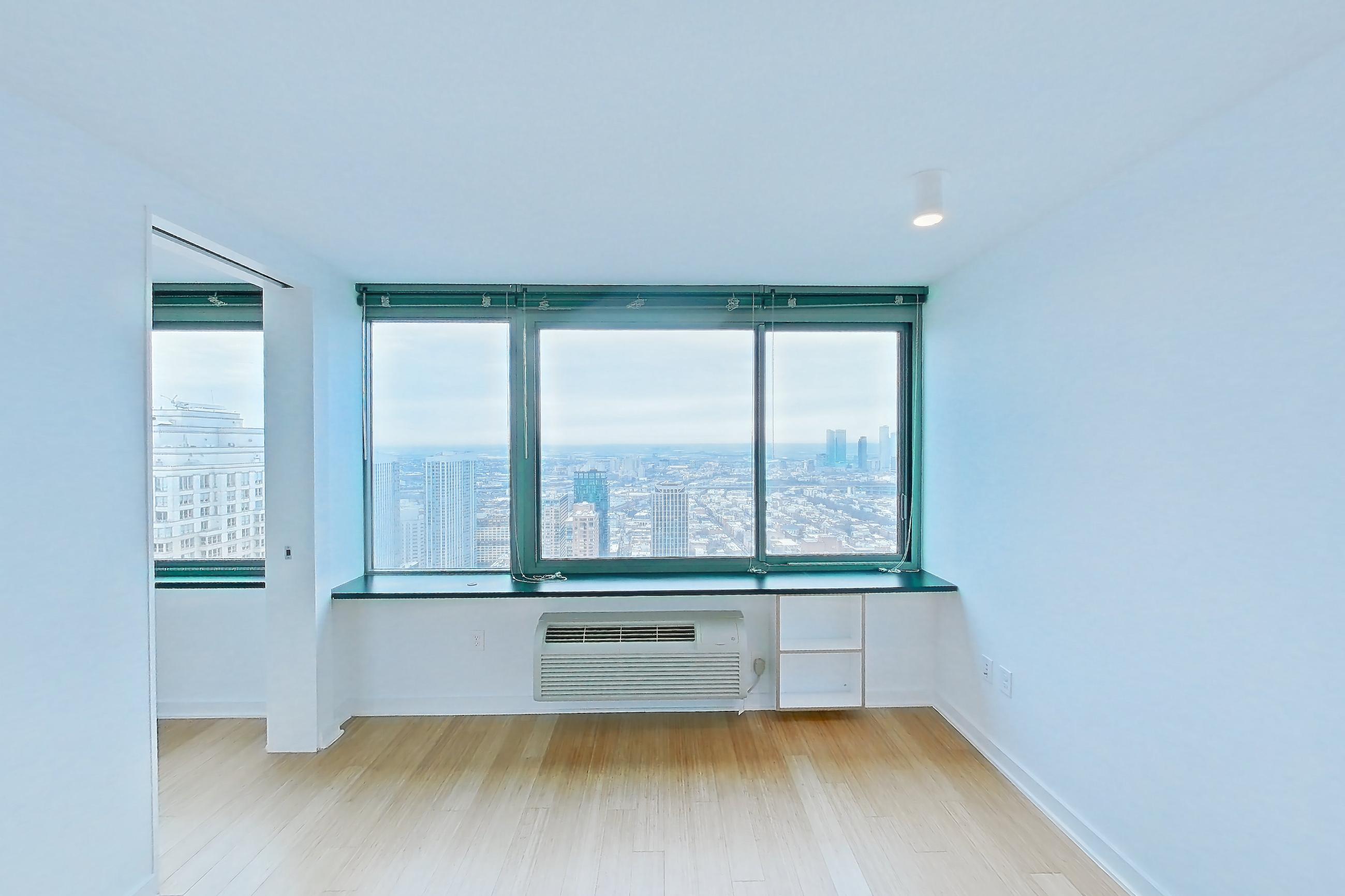 Living room with light wood-finish flooring, Apartment SAB-5706 at Sable