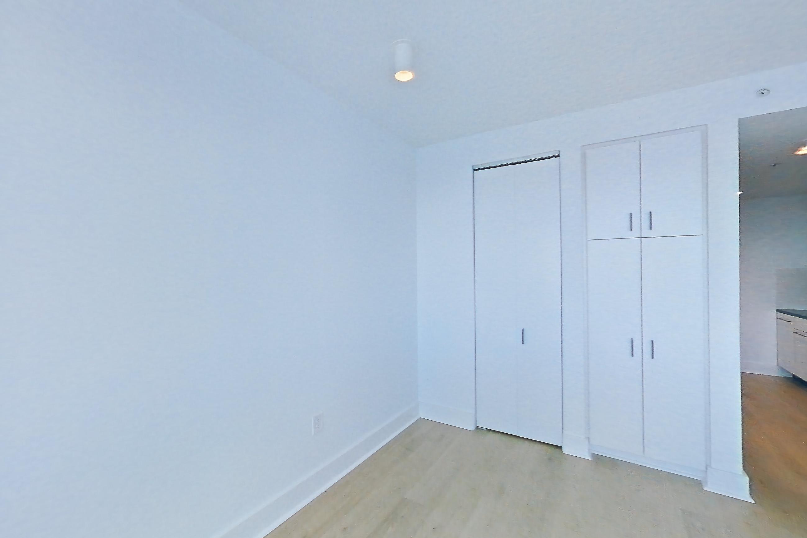 Living room with light wood-finish flooring, Apartment SAB-5812 at Sable
