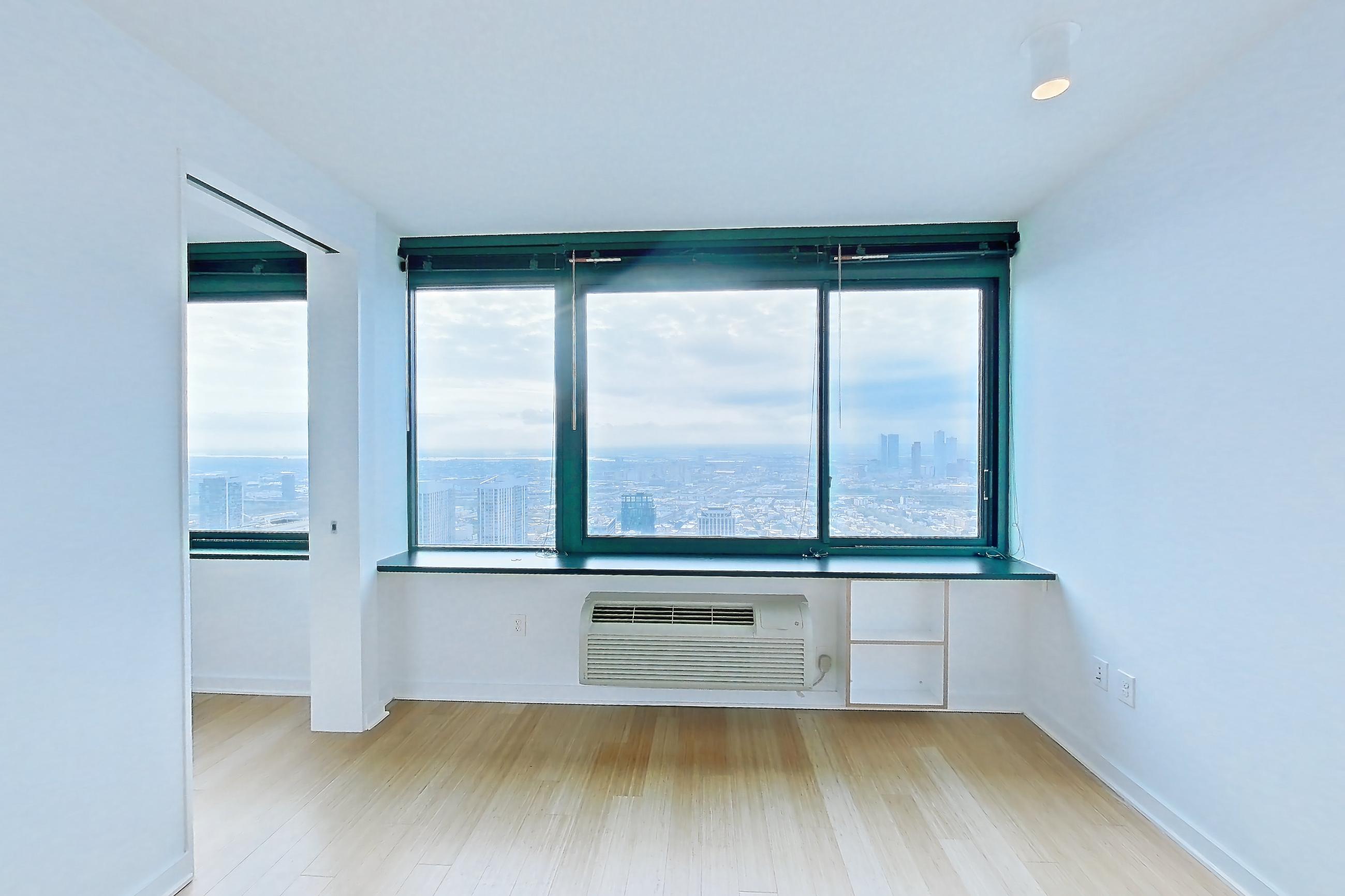 Living room with light wood-finish flooring, Apartment SAB-6606 at Sable