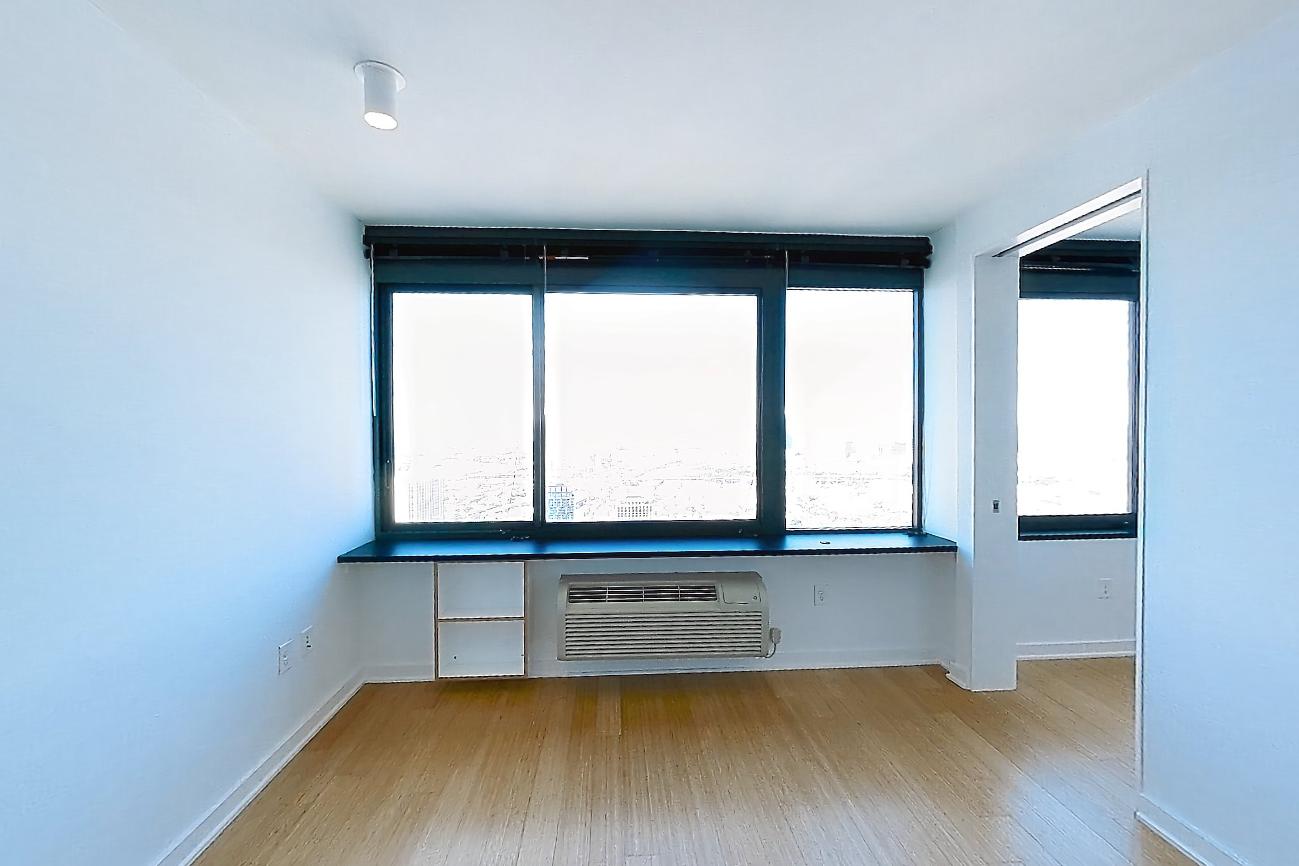 Living room with air conditioning and light wood-finish flooring, Apartment SAB-6707 at Sable