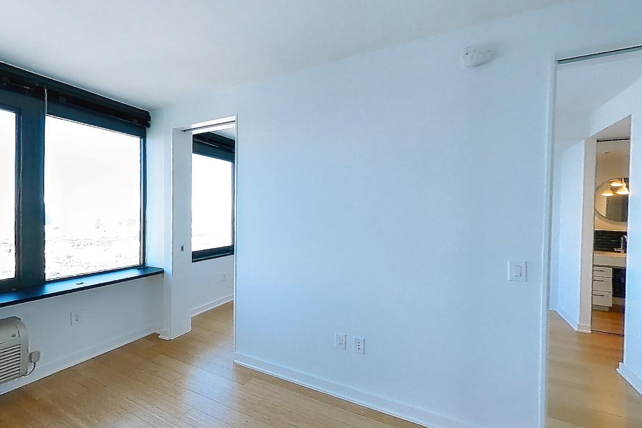 Living room with air conditioning and light wood-finish flooring, Apartment SAB-6707 at Sable
