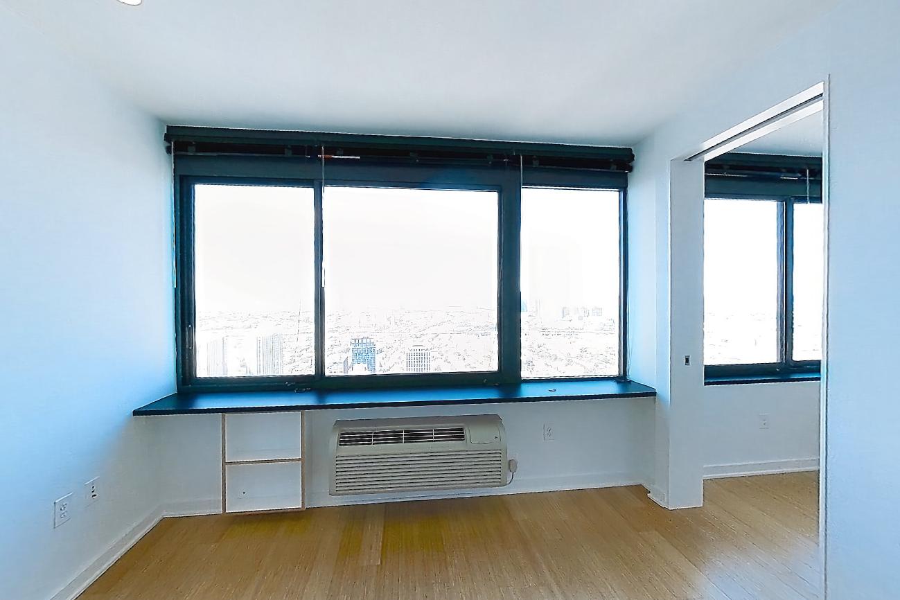 Living room with air conditioning and light wood-finish flooring, Apartment SAB-6907 at Sable