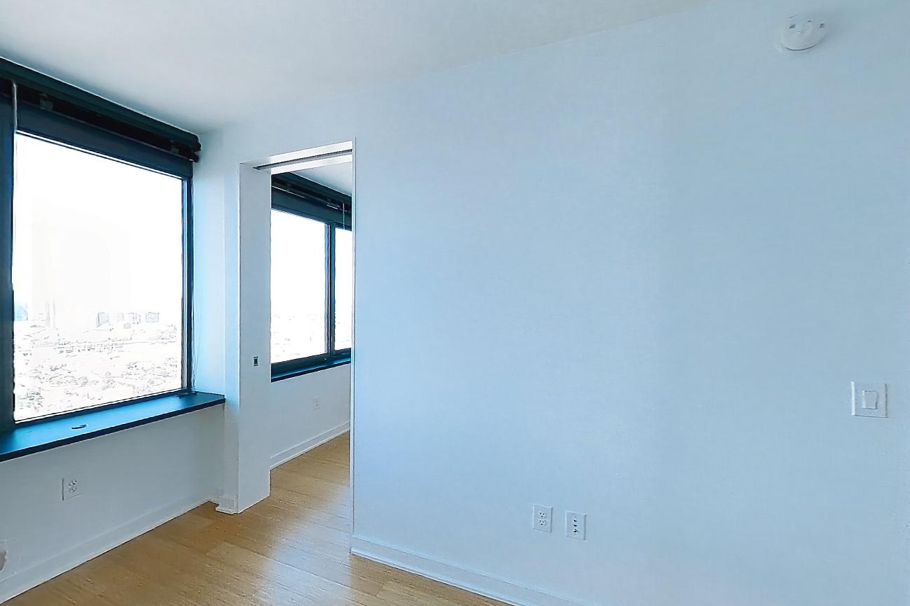 Living room with air conditioning and light wood-finish flooring, Apartment SAB-6907 at Sable