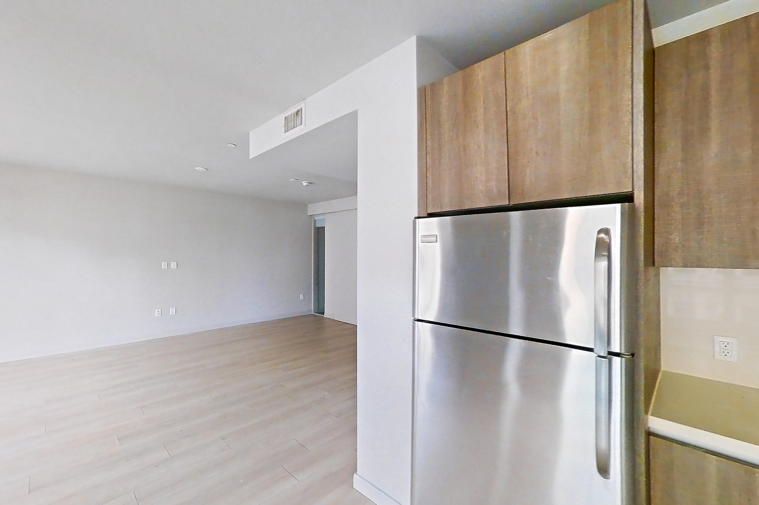 Kitchen in Apartment 0-6049 at Eighth and Grand, 2C floor plan