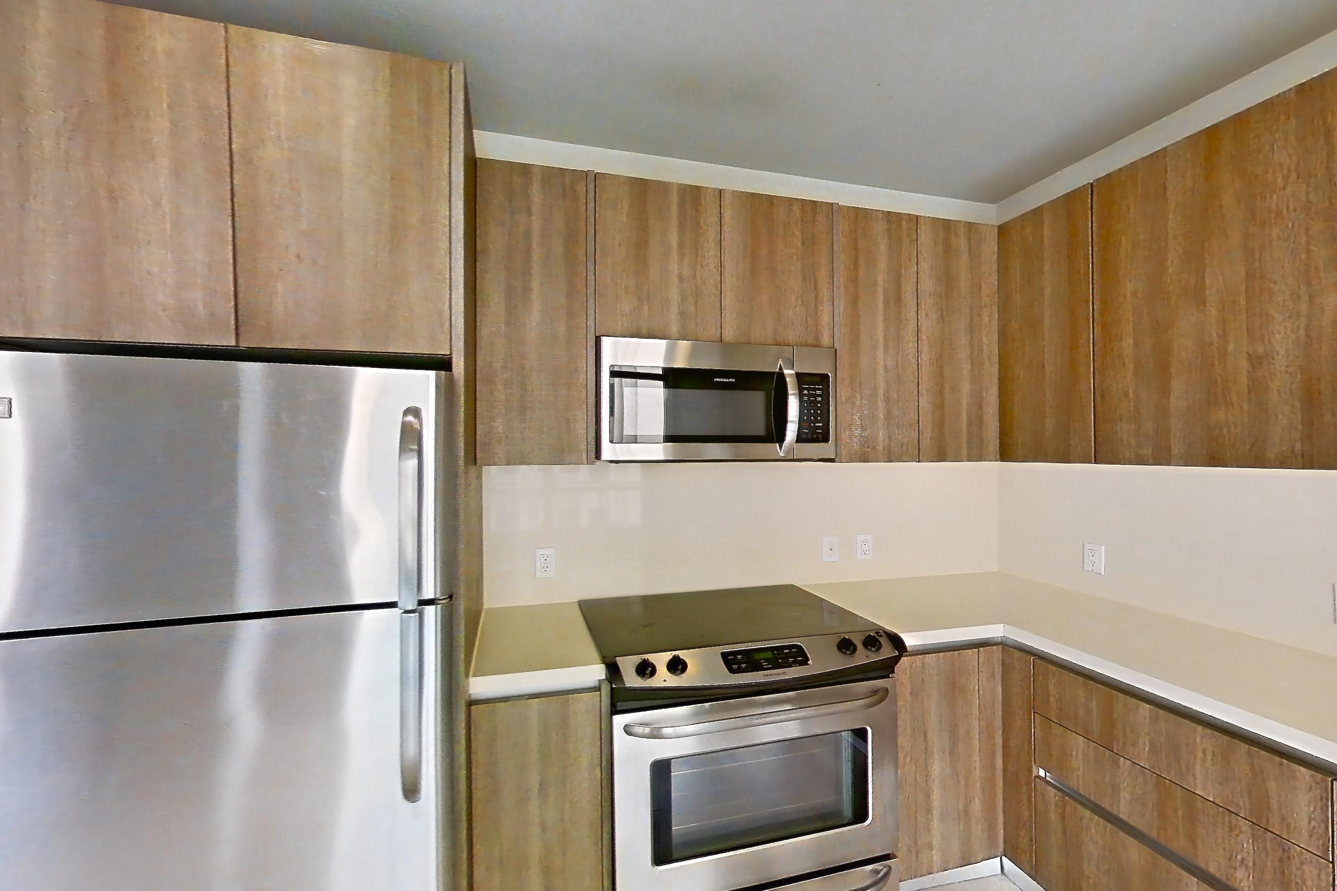Kitchen in Apartment 0-6049 at Eighth and Grand, 2C floor plan