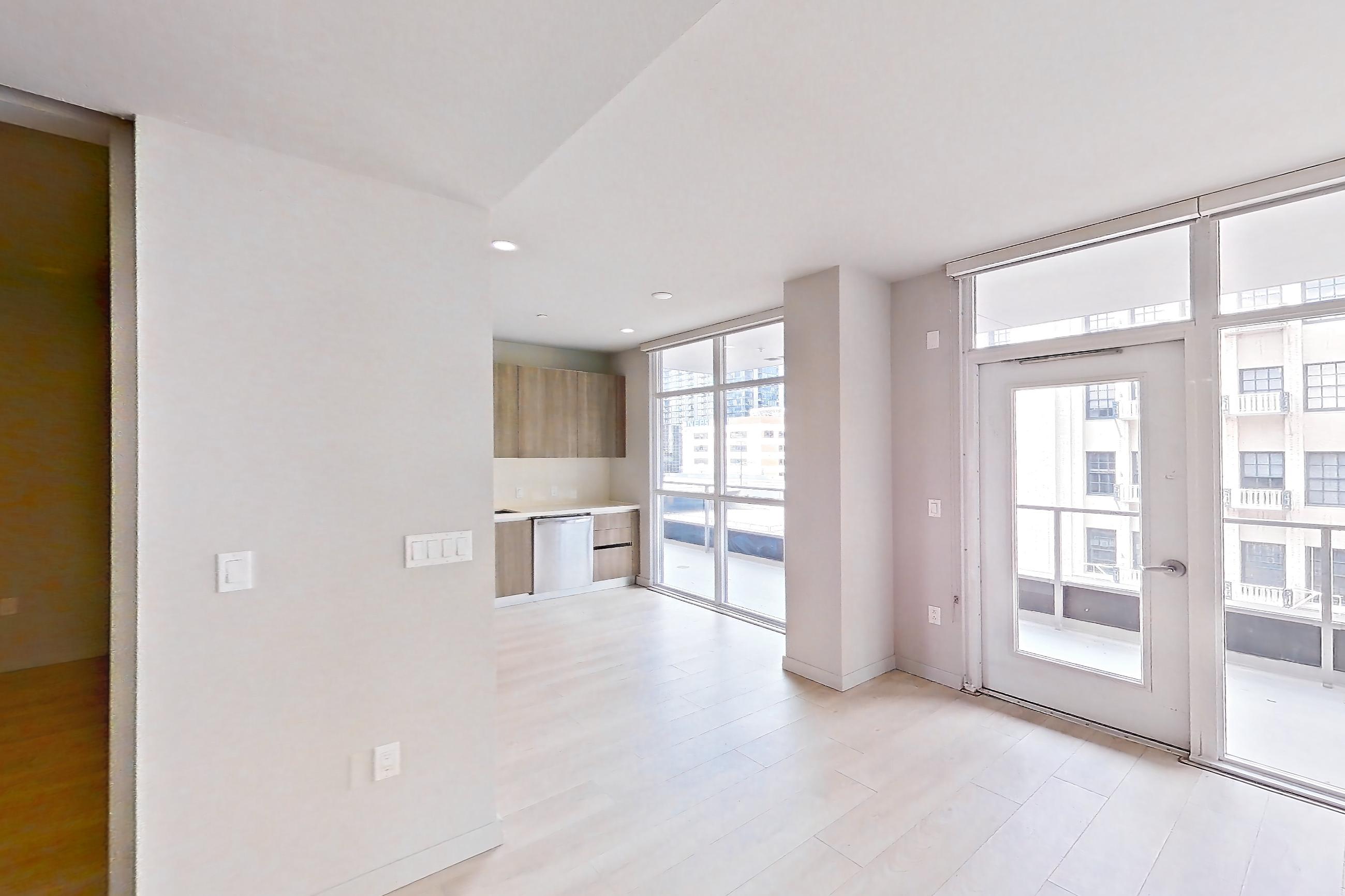 Living room in Apartment 0-6049 at Eighth and Grand, 2C floor plan