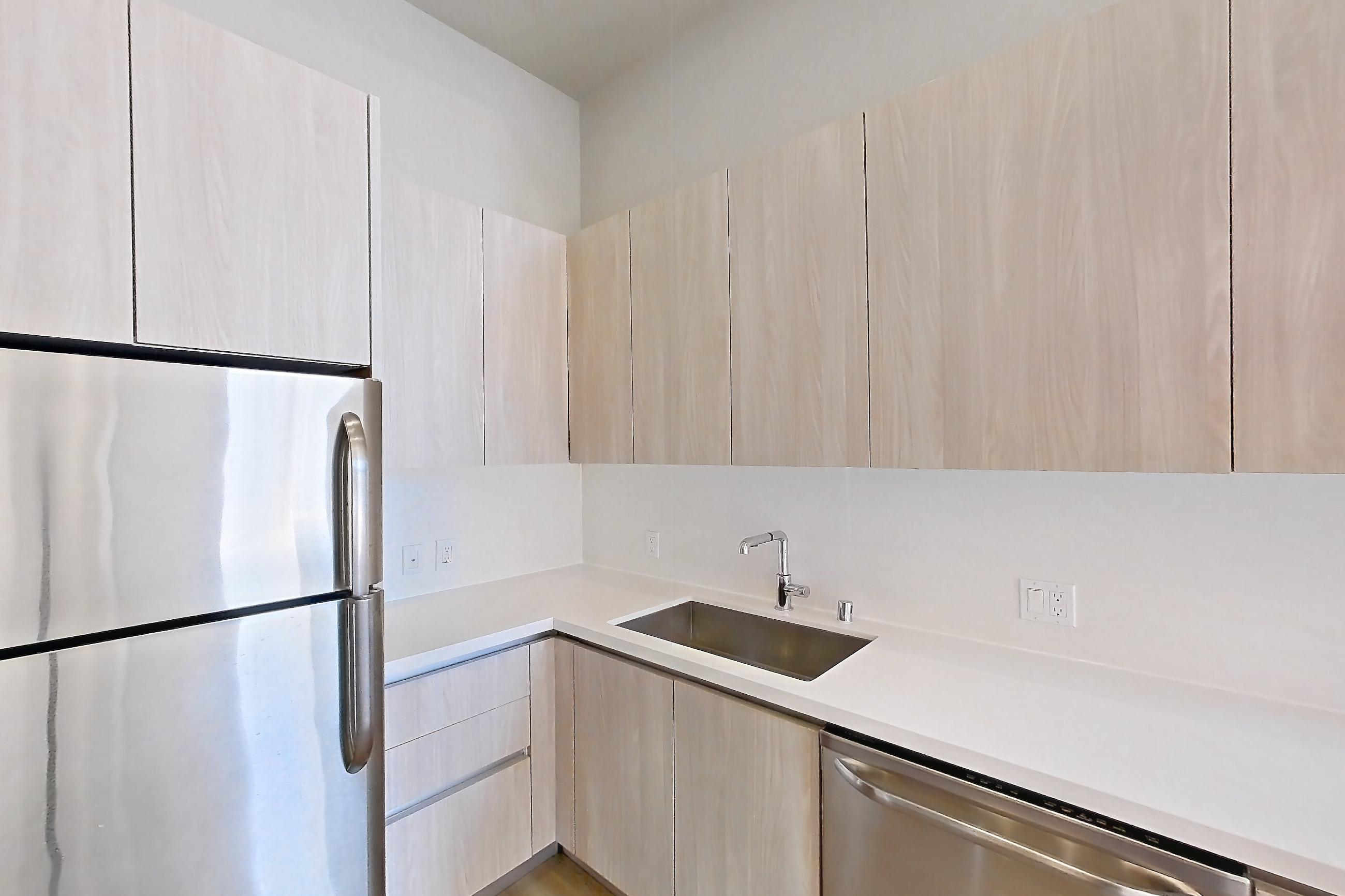 Kitchen in Apartment 0-7145 at Eighth and Grand, 2G floor plan