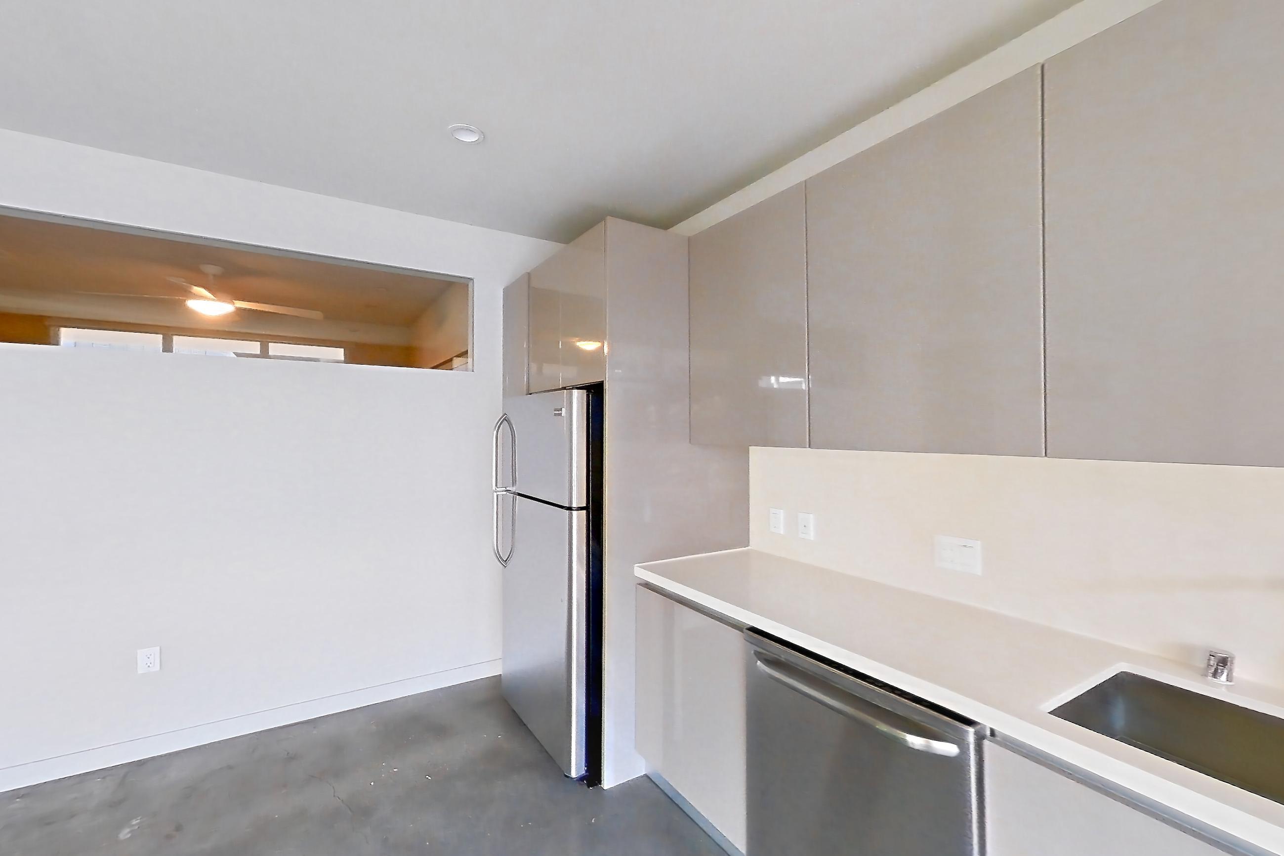 Kitchen in Apartment 0-2161 at Eighth and Grand, 2J floor plan