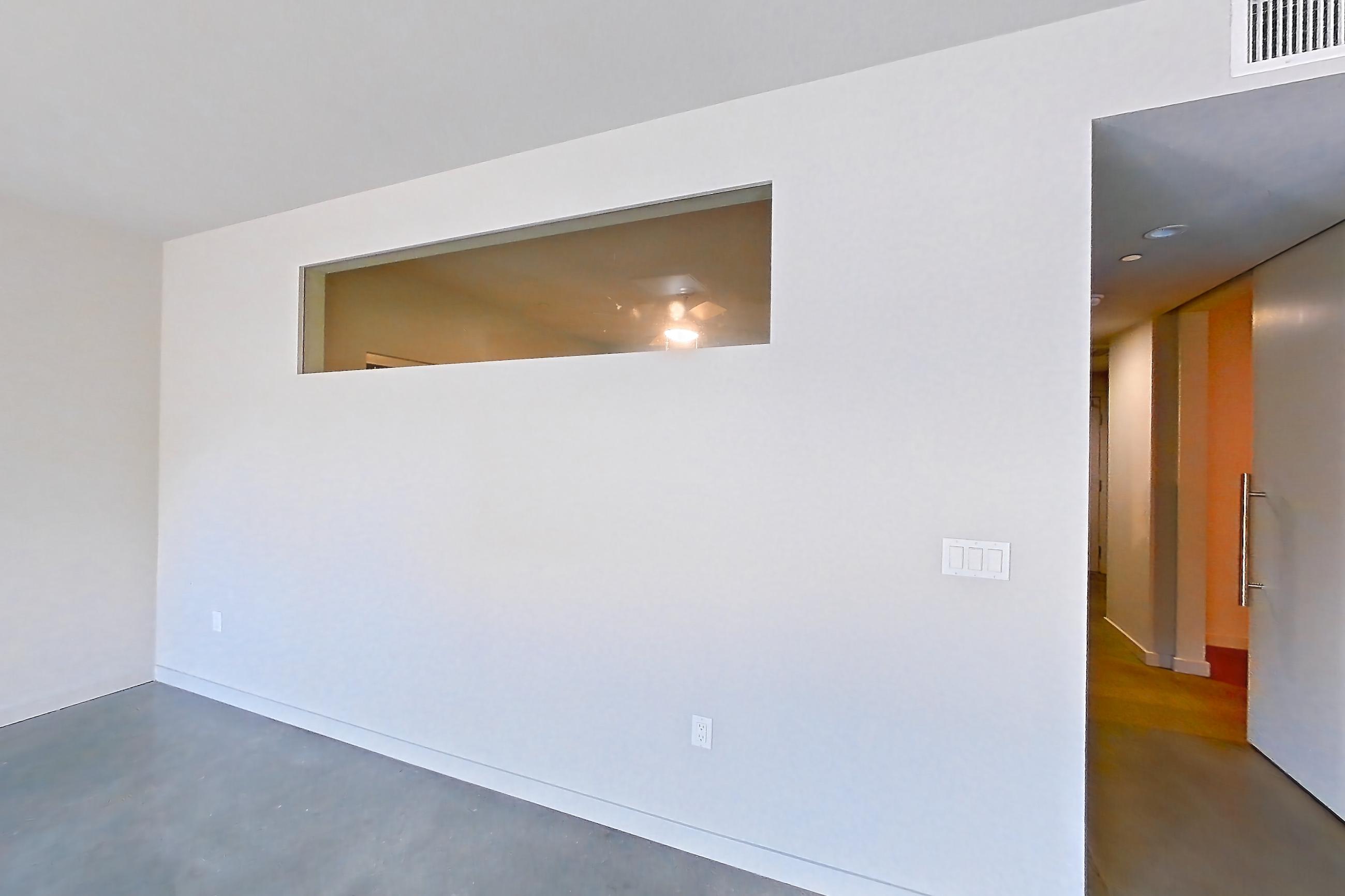 Living room in Apartment 0-2161 at Eighth and Grand, 2J floor plan