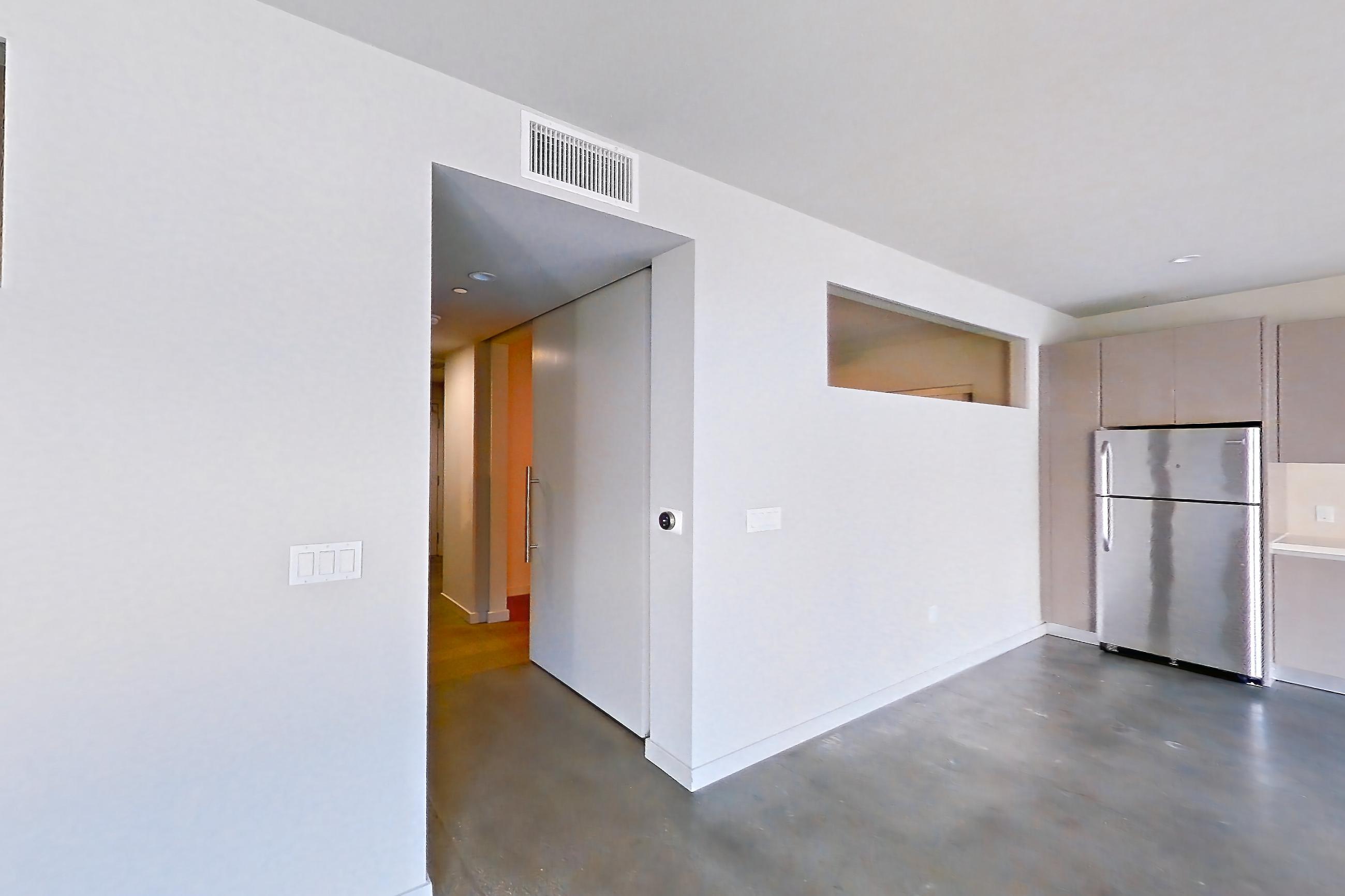 Living room in Apartment 0-2161 at Eighth and Grand, 2J floor plan