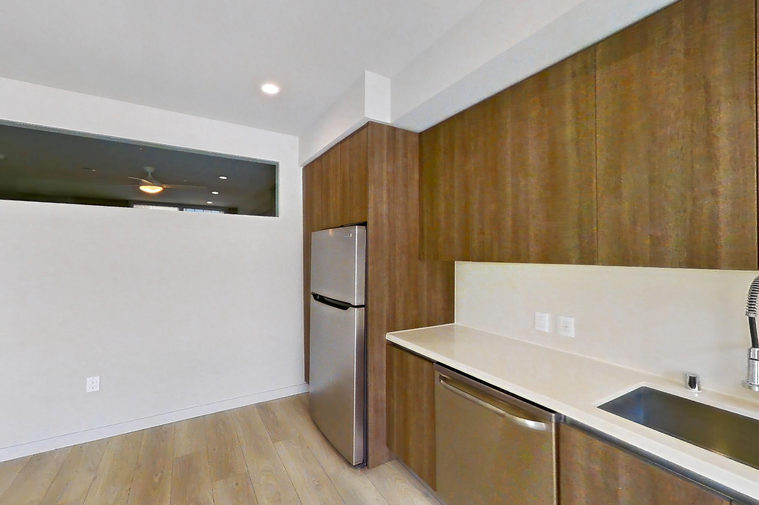 Kitchen in Apartment 0-6057 at Eighth and Grand, 2N floor plan