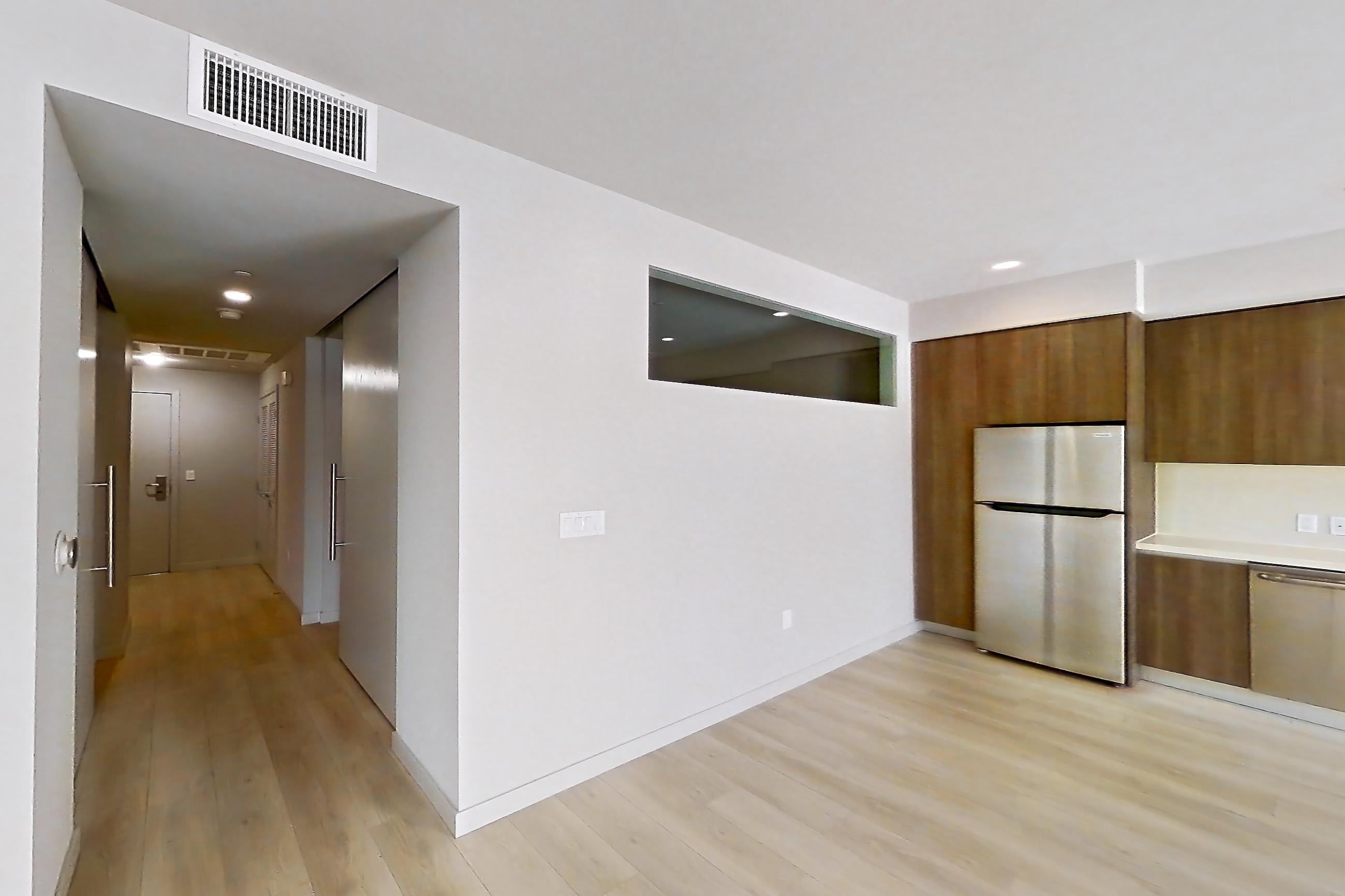 Living room in Apartment 0-6057 at Eighth and Grand, 2N floor plan
