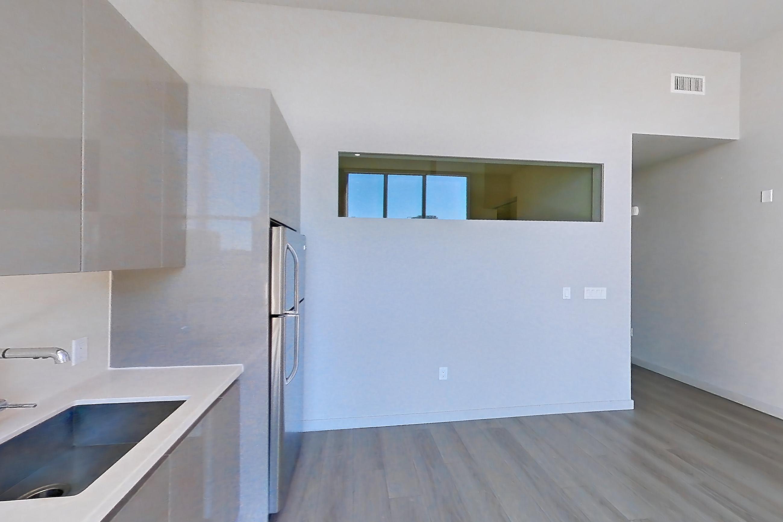 Kitchen in Apartment 0-7167 at Eighth and Grand, Jr 1A floor plan