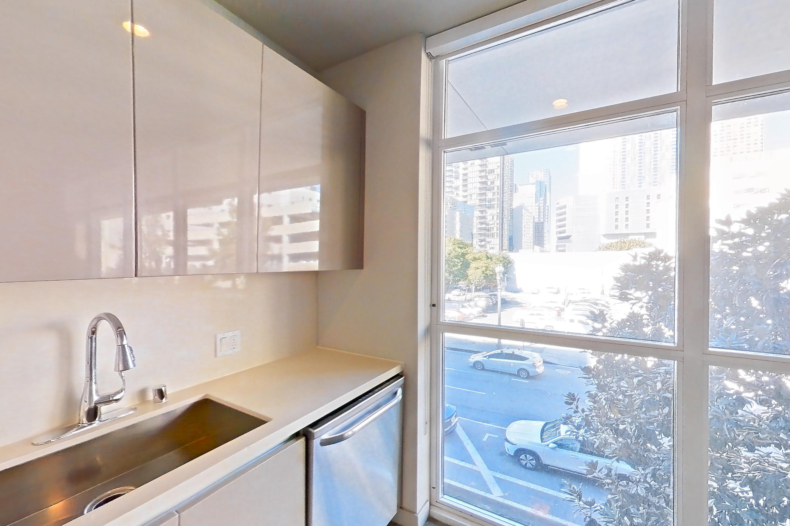 Kitchen in Apartment 0-2003 at Eighth and Grand, Jr 1R floor plan