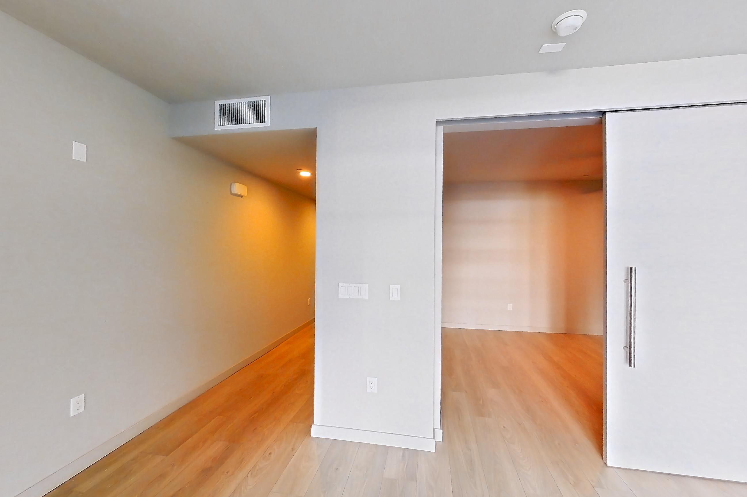 Living room in Apartment 0-3136 at Eighth and Grand, Jr 1U floor plan