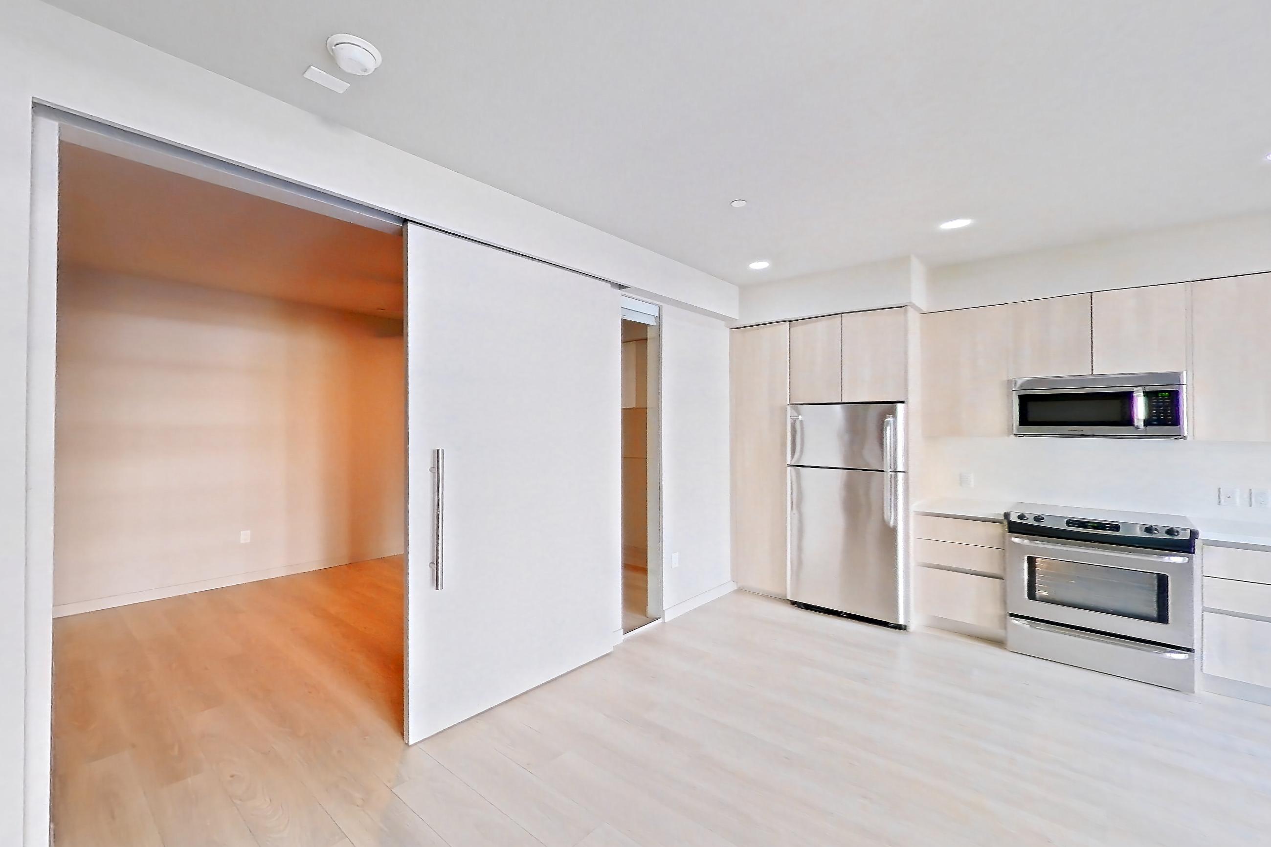 Living room in Apartment 0-3136 at Eighth and Grand, Jr 1U floor plan