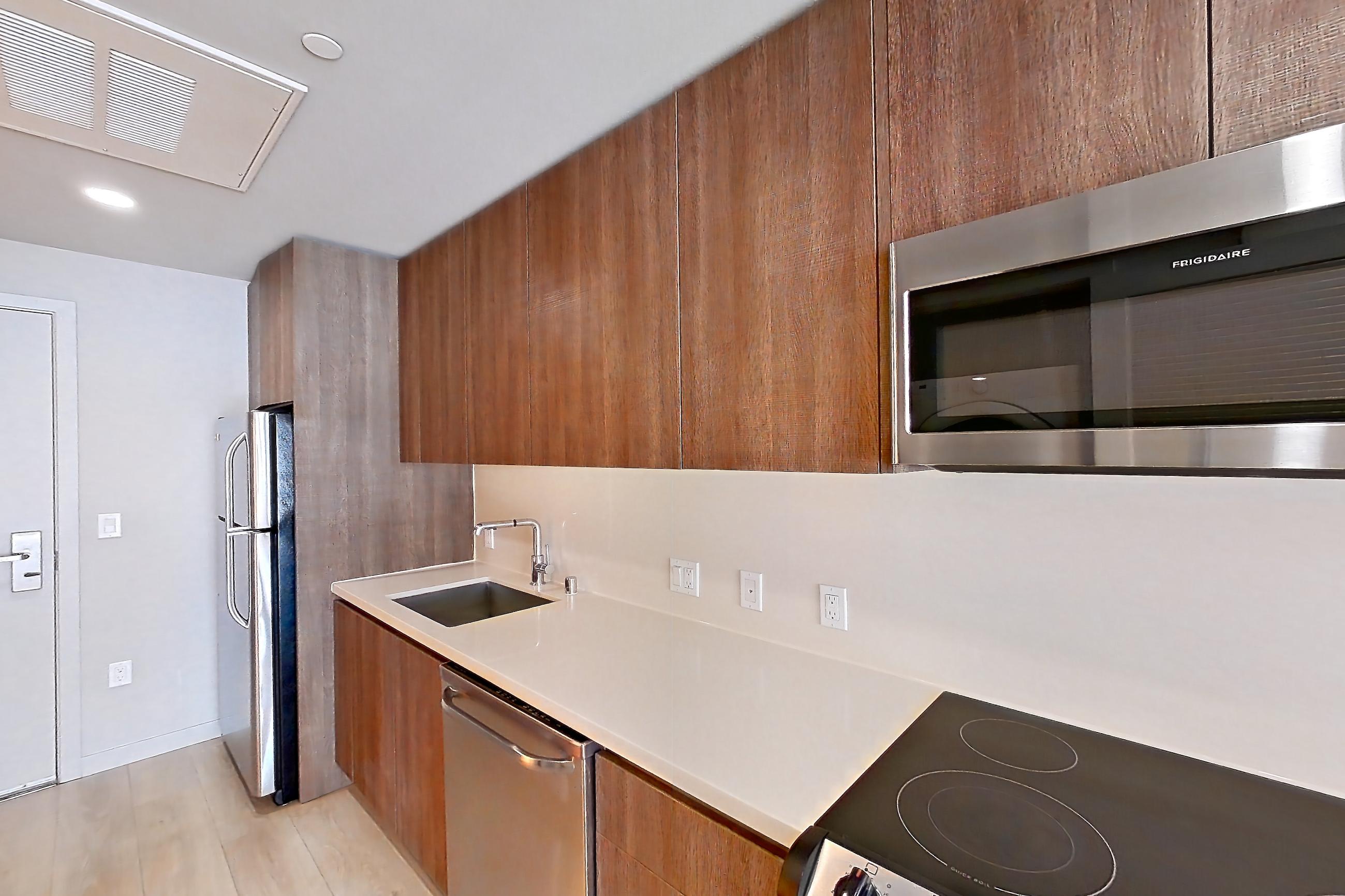 Kitchen in Apartment 0-5058 at Eighth and Grand, 0A floor plan