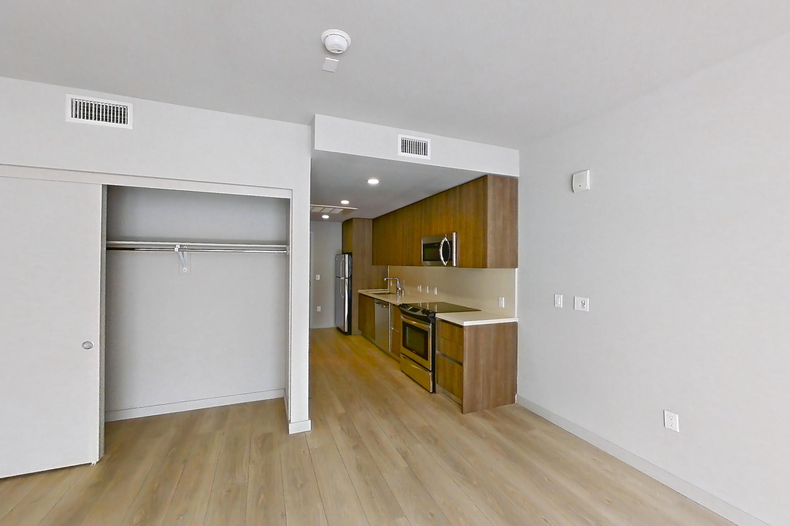 Living room in Apartment 0-5058 at Eighth and Grand, 0A floor plan