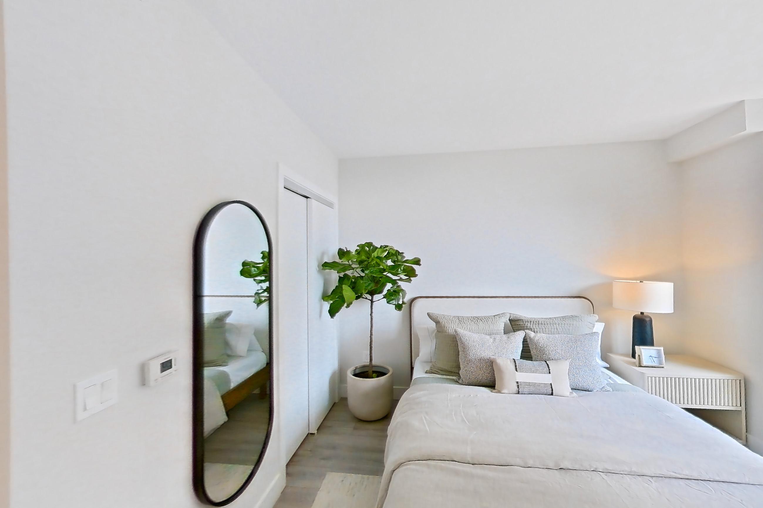 Living space with light wood-finish flooring, Apartment 905 at Loden