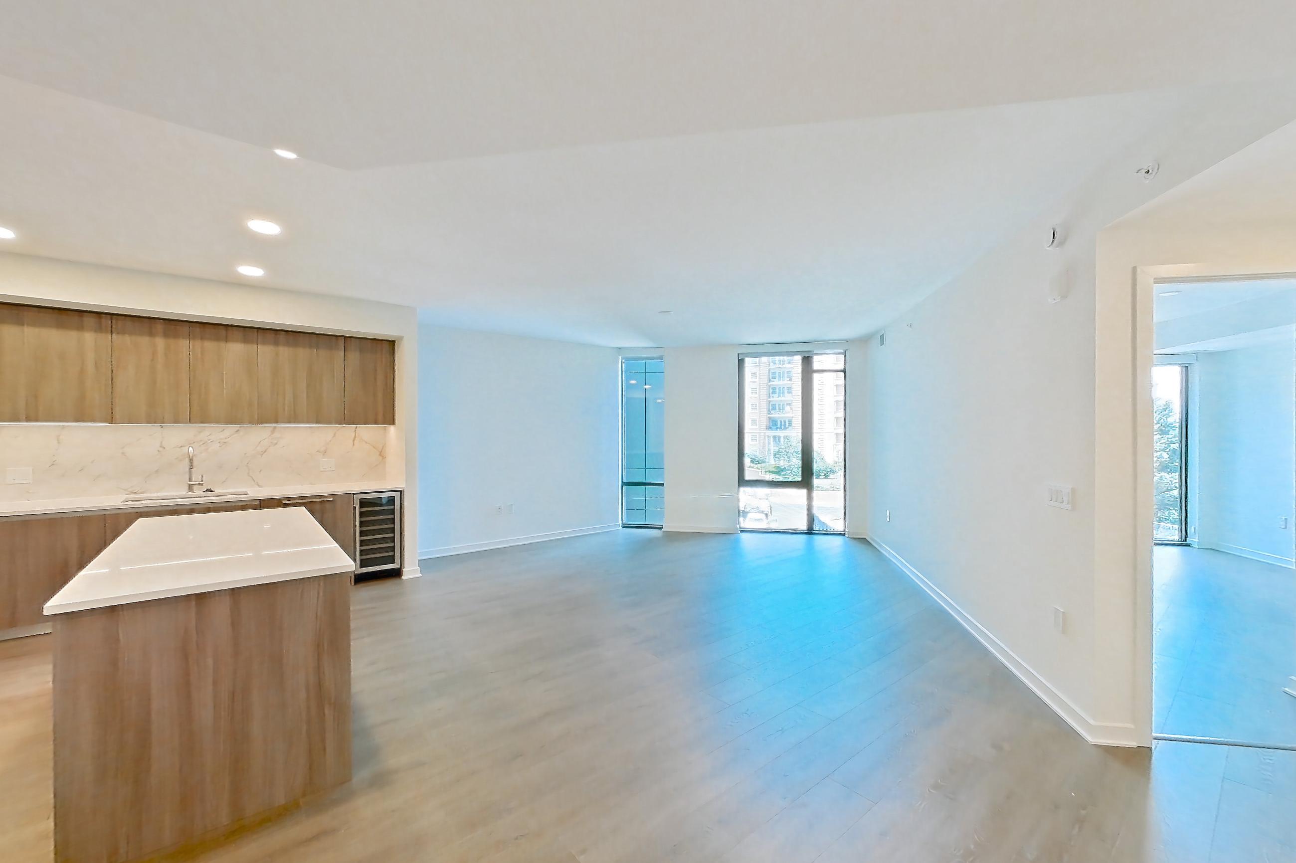 Dining room with gas range, light wood-finish flooring, oven/range, and stainless steel appliances, Apartment 0310 at Aerie