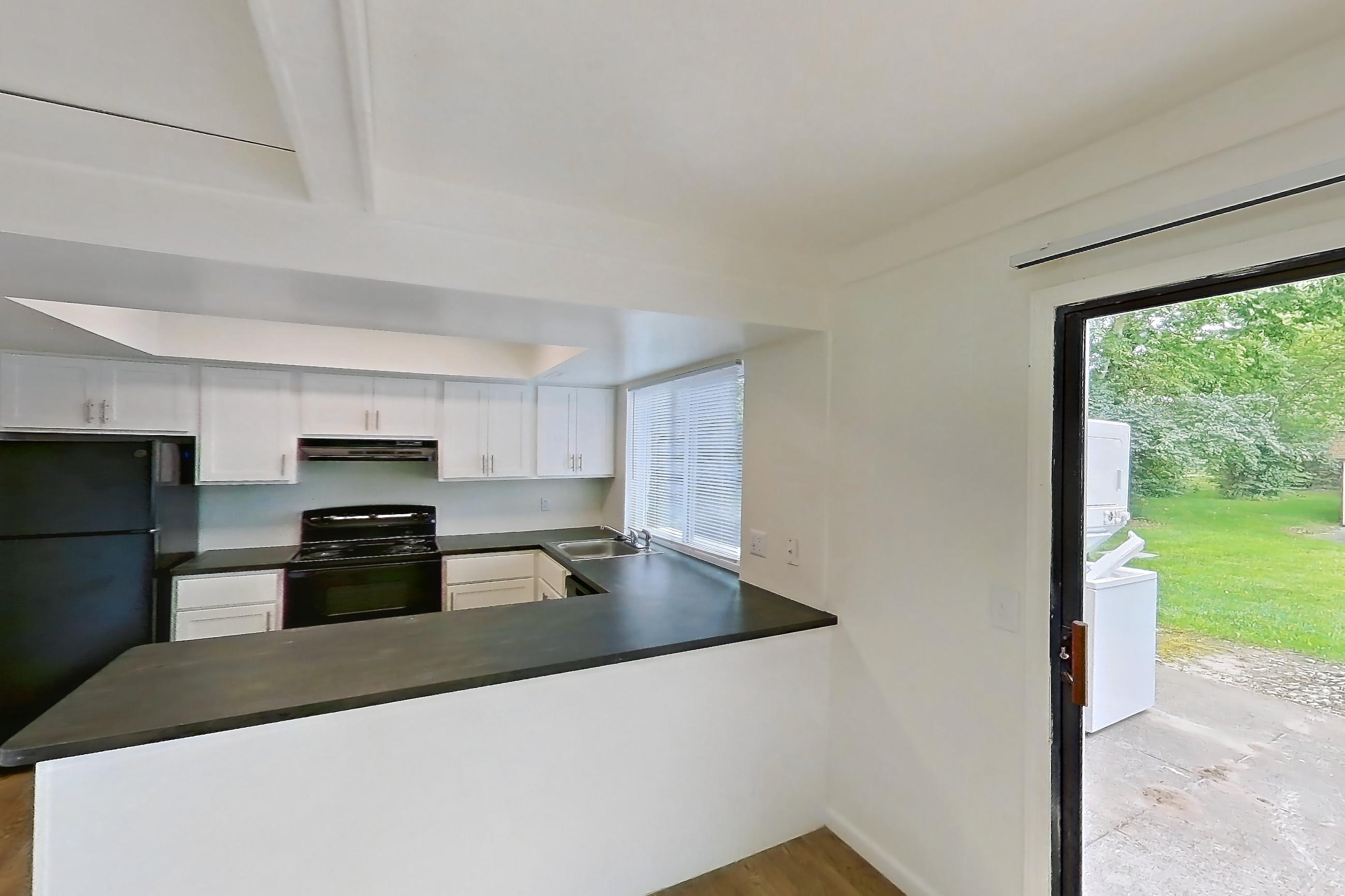 Dining room in a King Henry floor plan apartment, representative of Apartment 3002CA at Canterbury Green