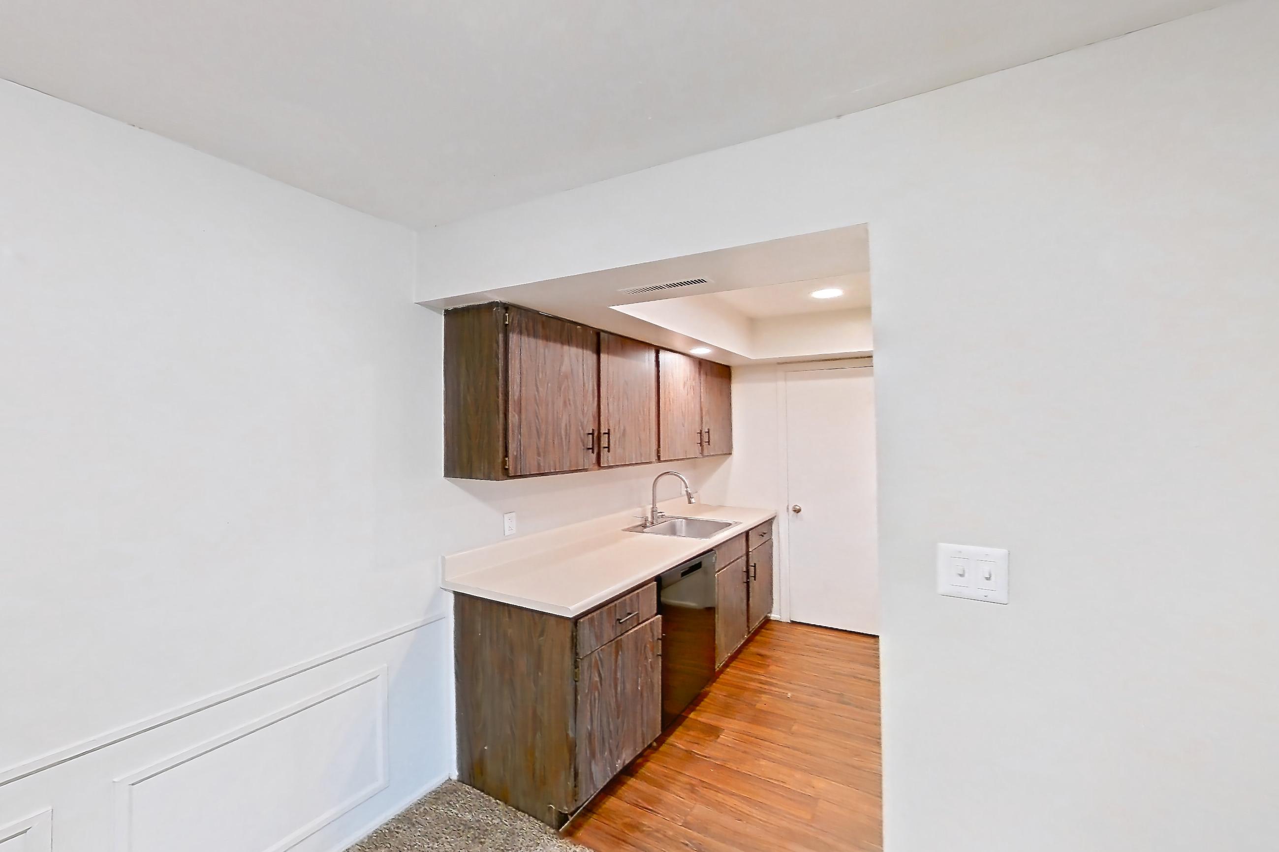Dining room in a Guildhall floor plan apartment, representative of Apartment 2421-2AB at Canterbury Green