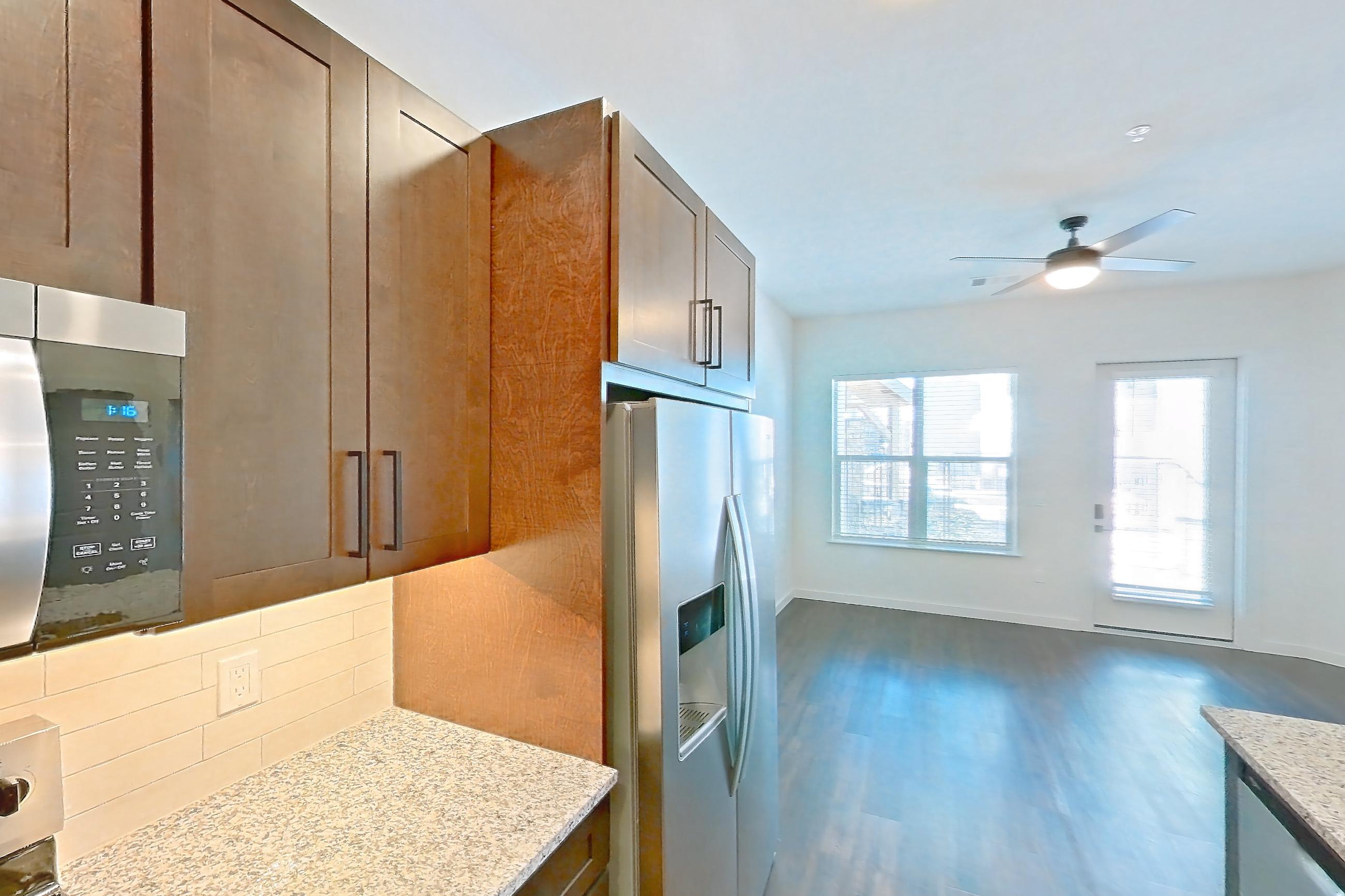 Kitchen in Apartment 1-121 at Cortland Peterson, A3 floor plan