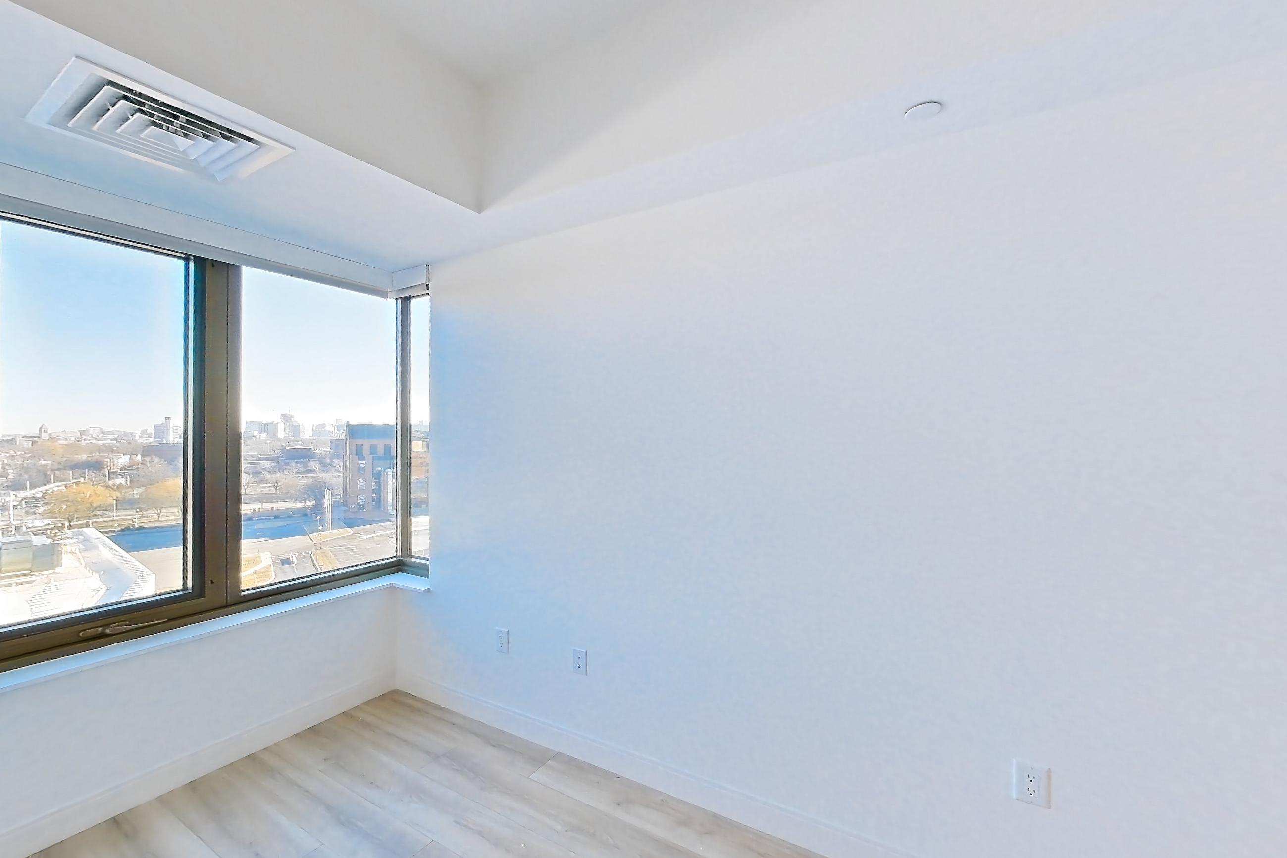 Living space with light wood-finish flooring, Apartment 924H at Verra