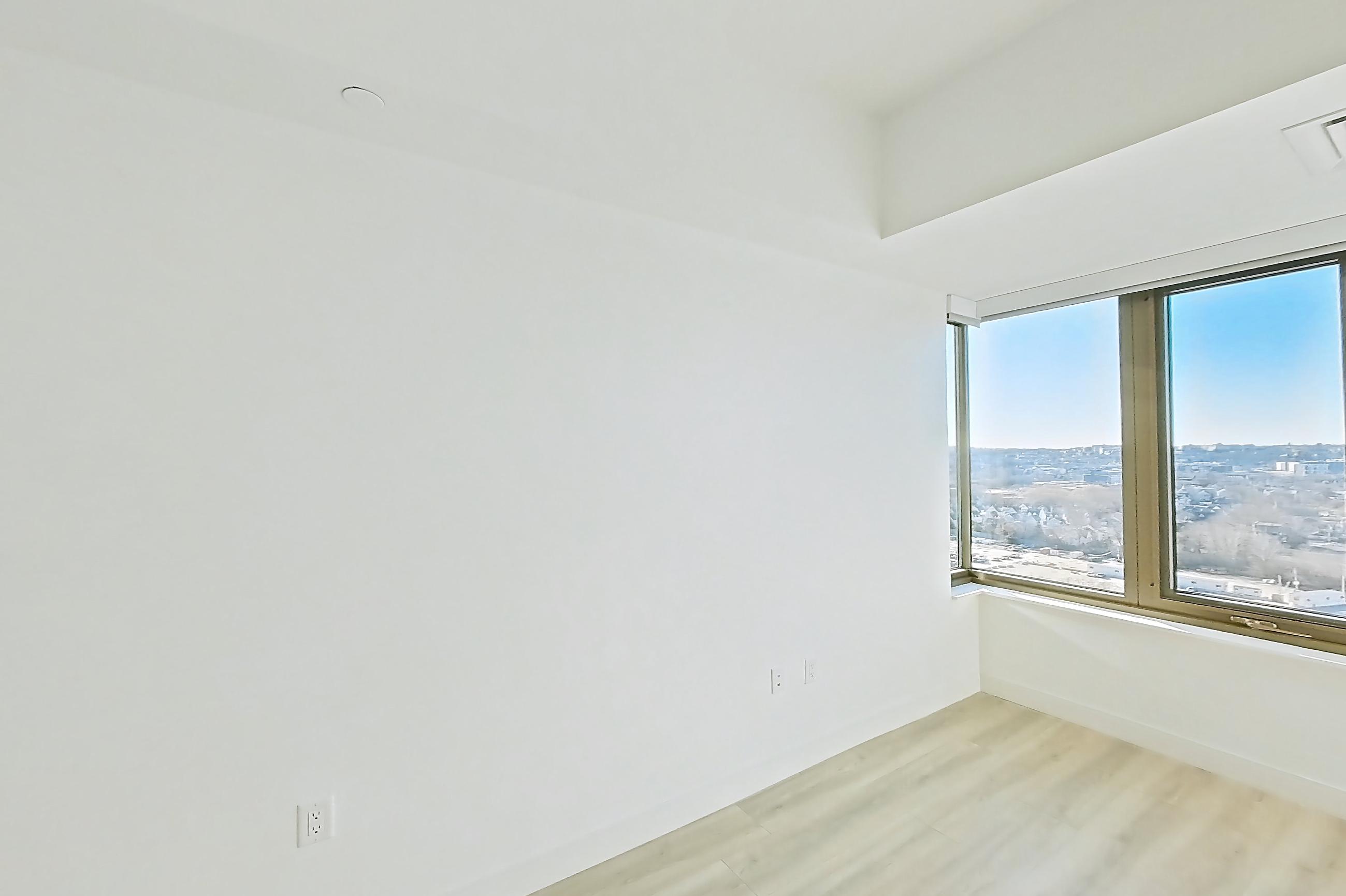 Living space with light wood-finish flooring, Apartment 1633H at Verra