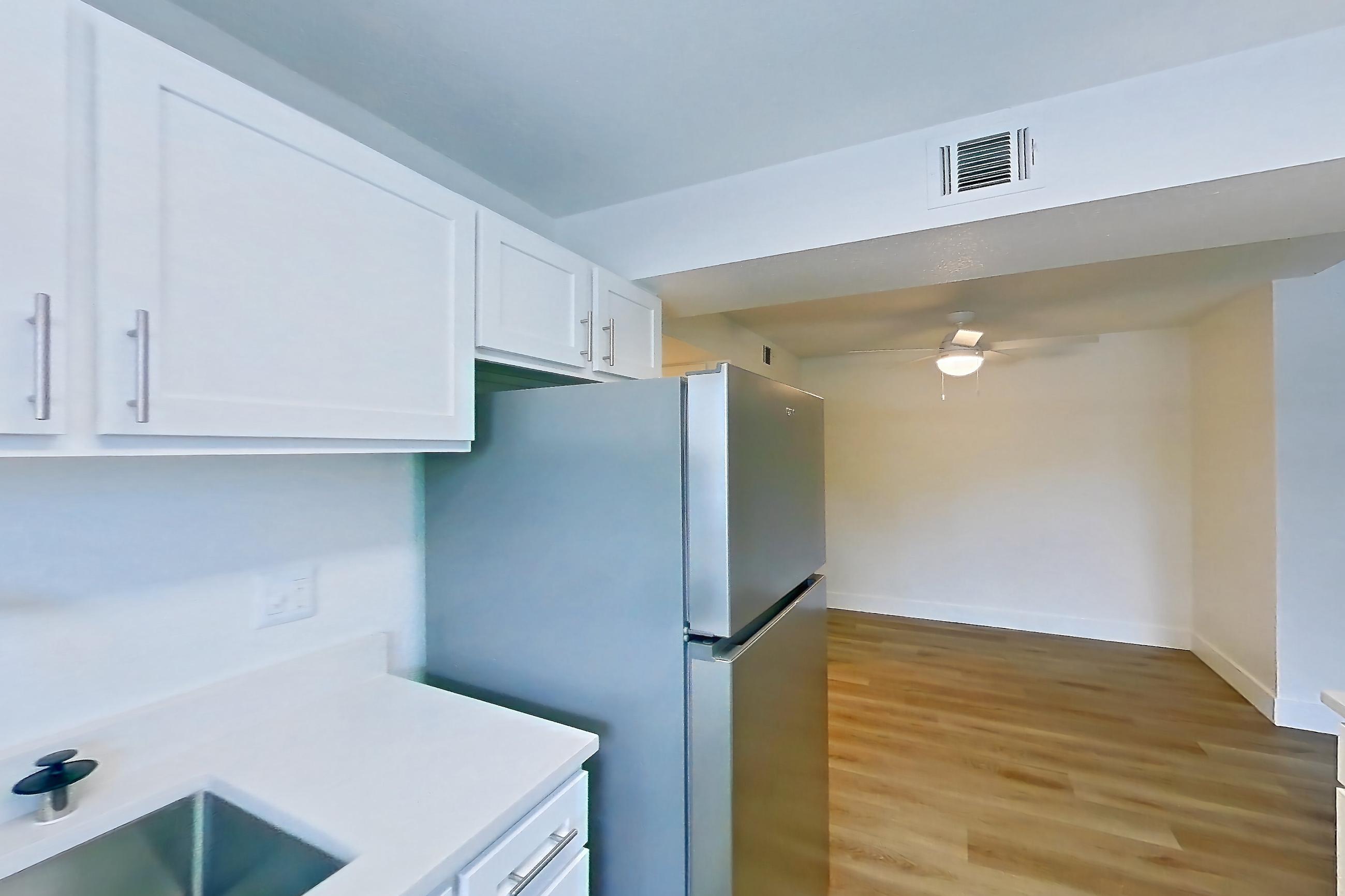 Kitchen in a 1A floor plan apartment, representative of Apartment 28-1064 at Xander 3900