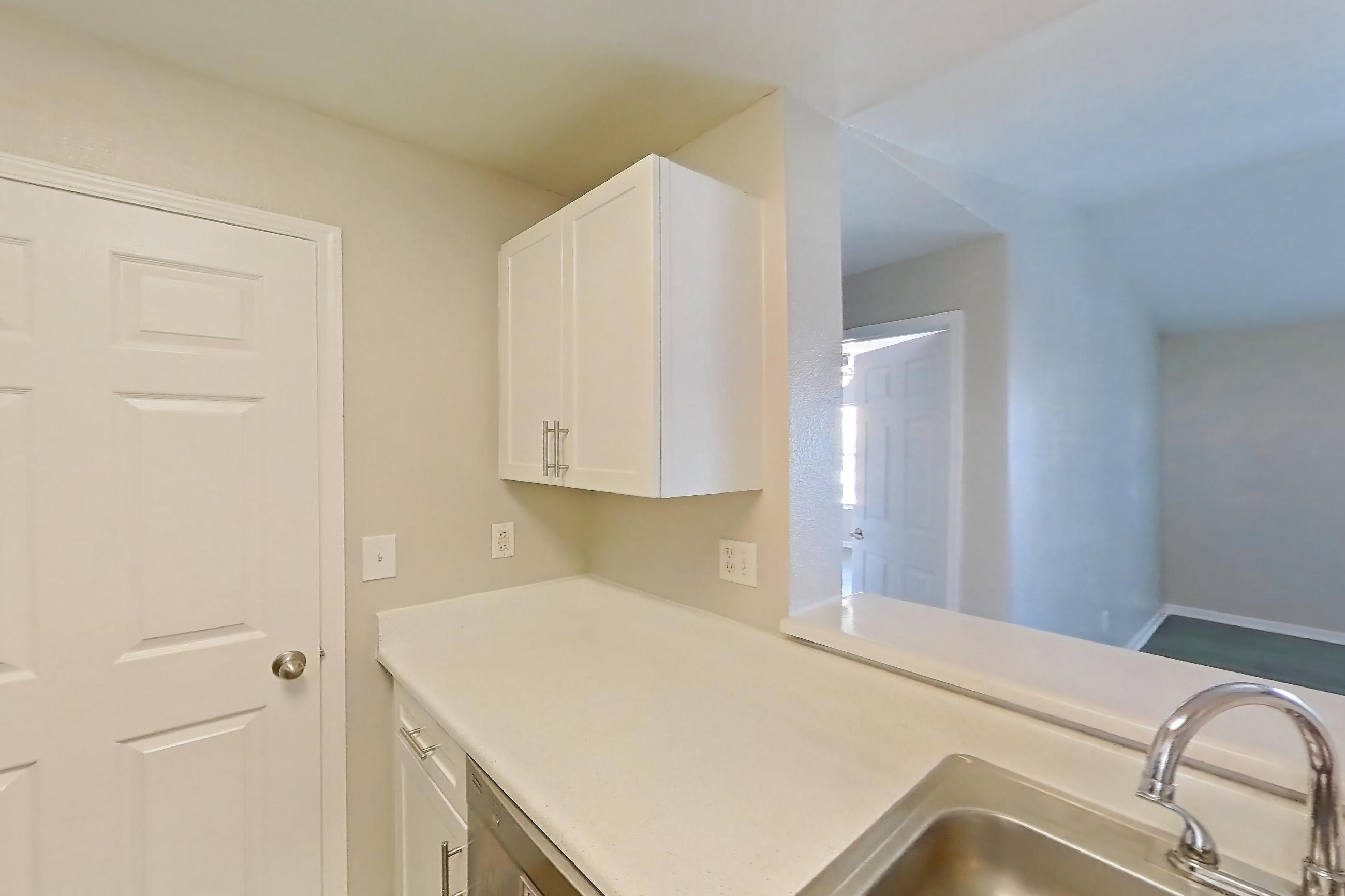 Kitchen in a 2A floor plan apartment, representative of Apartment 13-1090 at Xander 3900