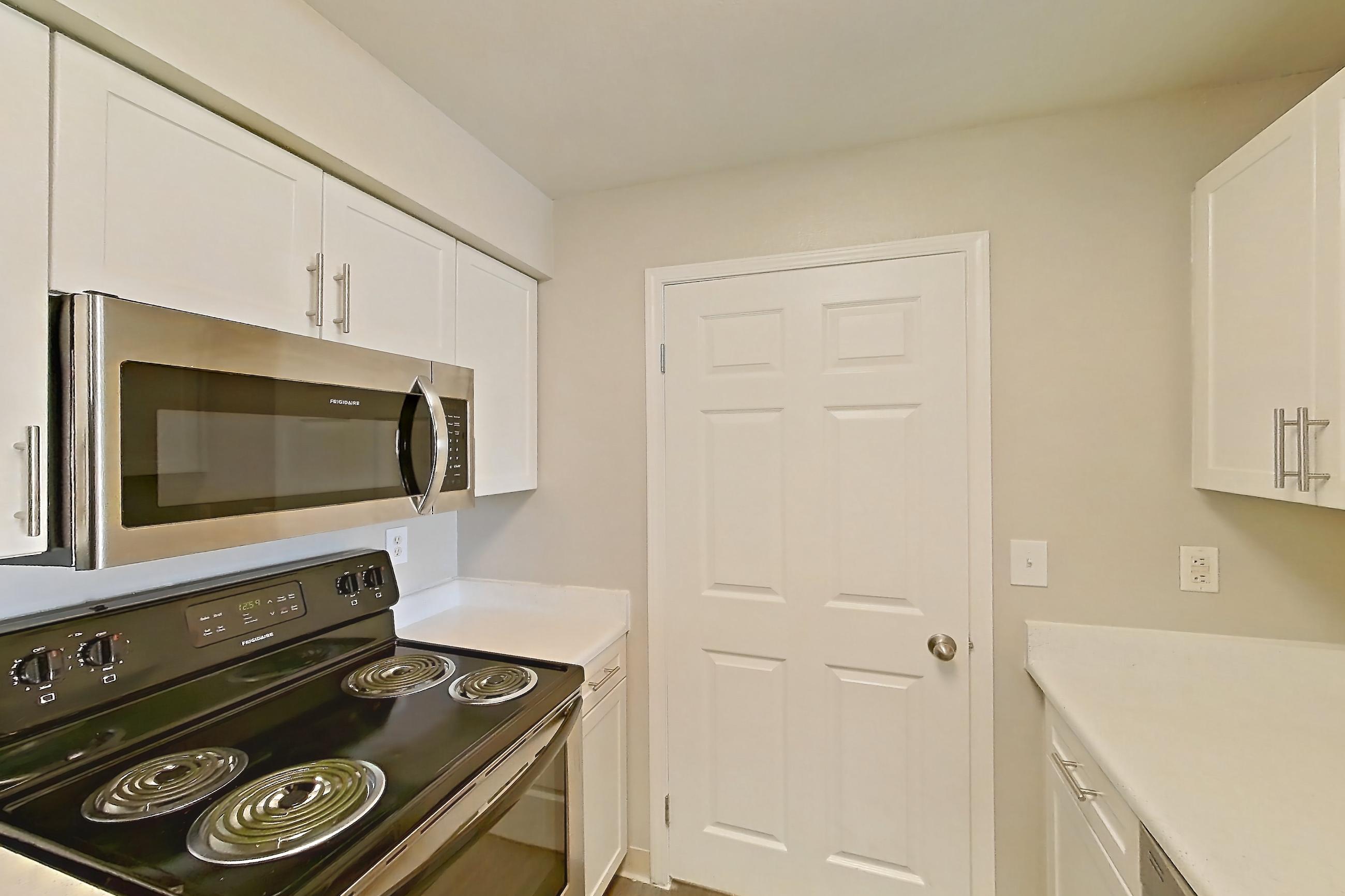 Kitchen in a 2A floor plan apartment, representative of Apartment 13-1090 at Xander 3900