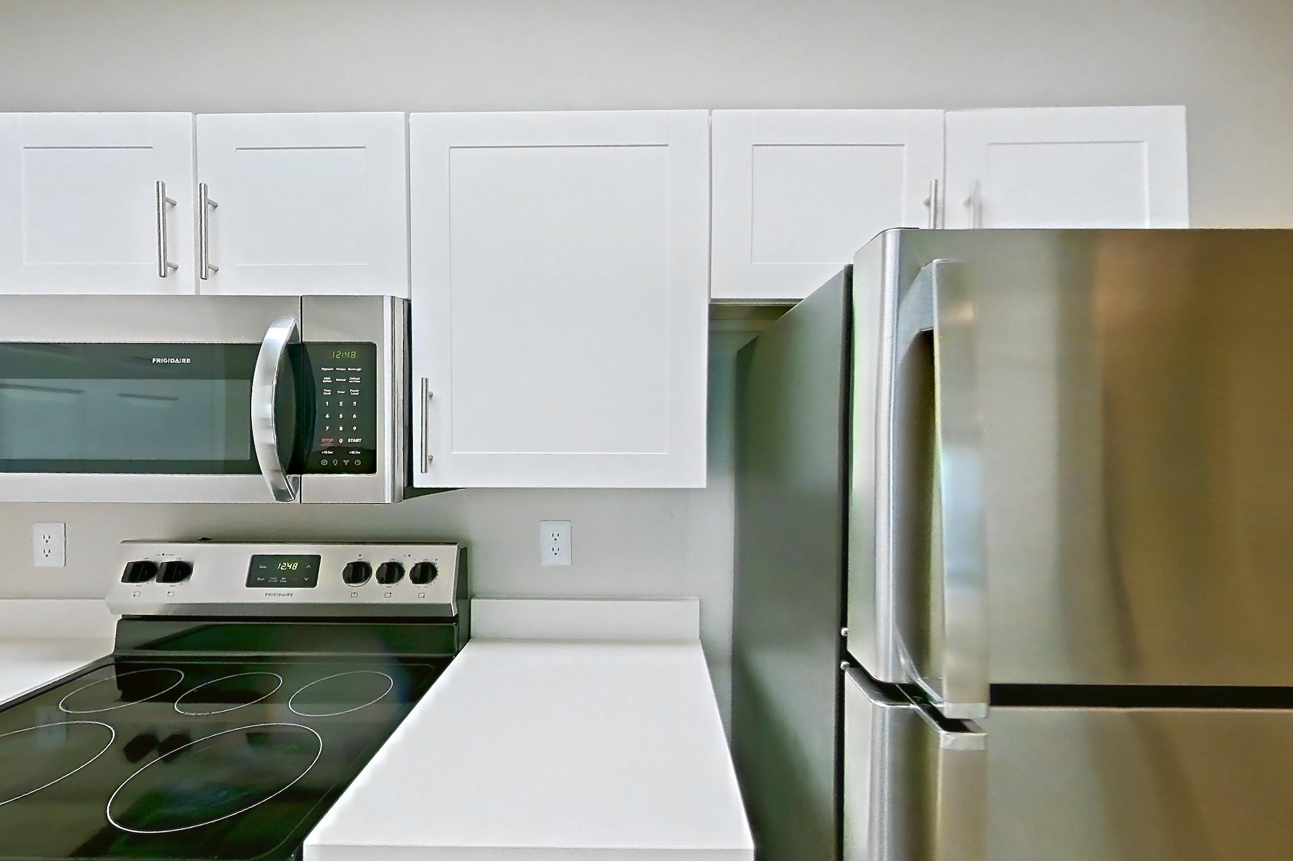 Kitchen in a 2B floor plan apartment, representative of Apartment 01-2008 at Xander 3900