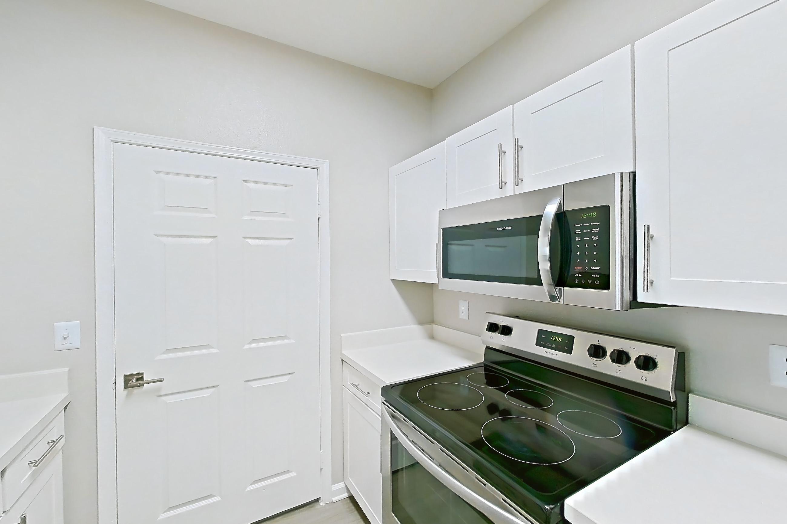 Kitchen in a 2B floor plan apartment, representative of Apartment 01-2008 at Xander 3900