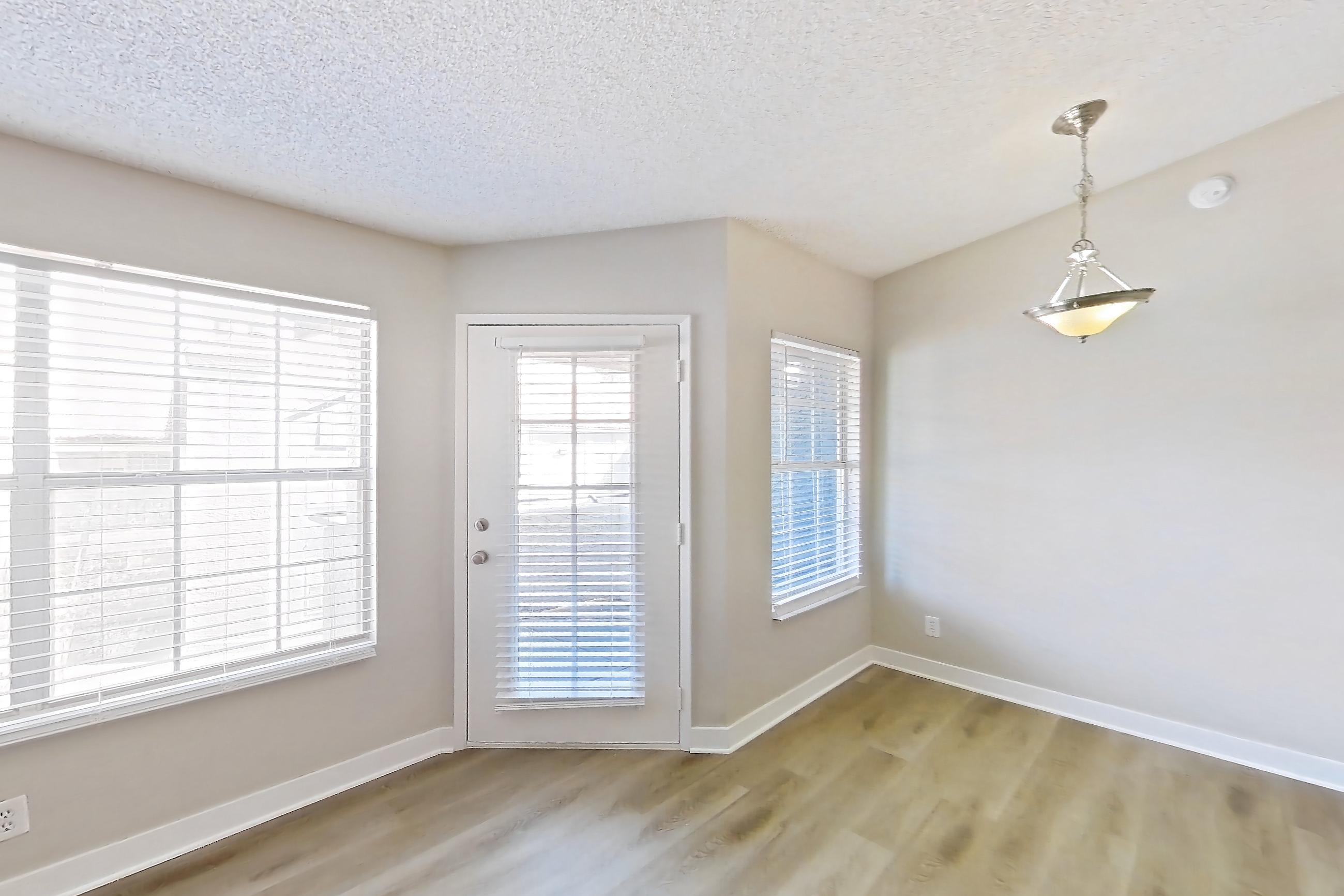 Living room with fireplace, light wood-finish flooring, and marble fireplace, Apartment 2171 at The Met Las Vegas