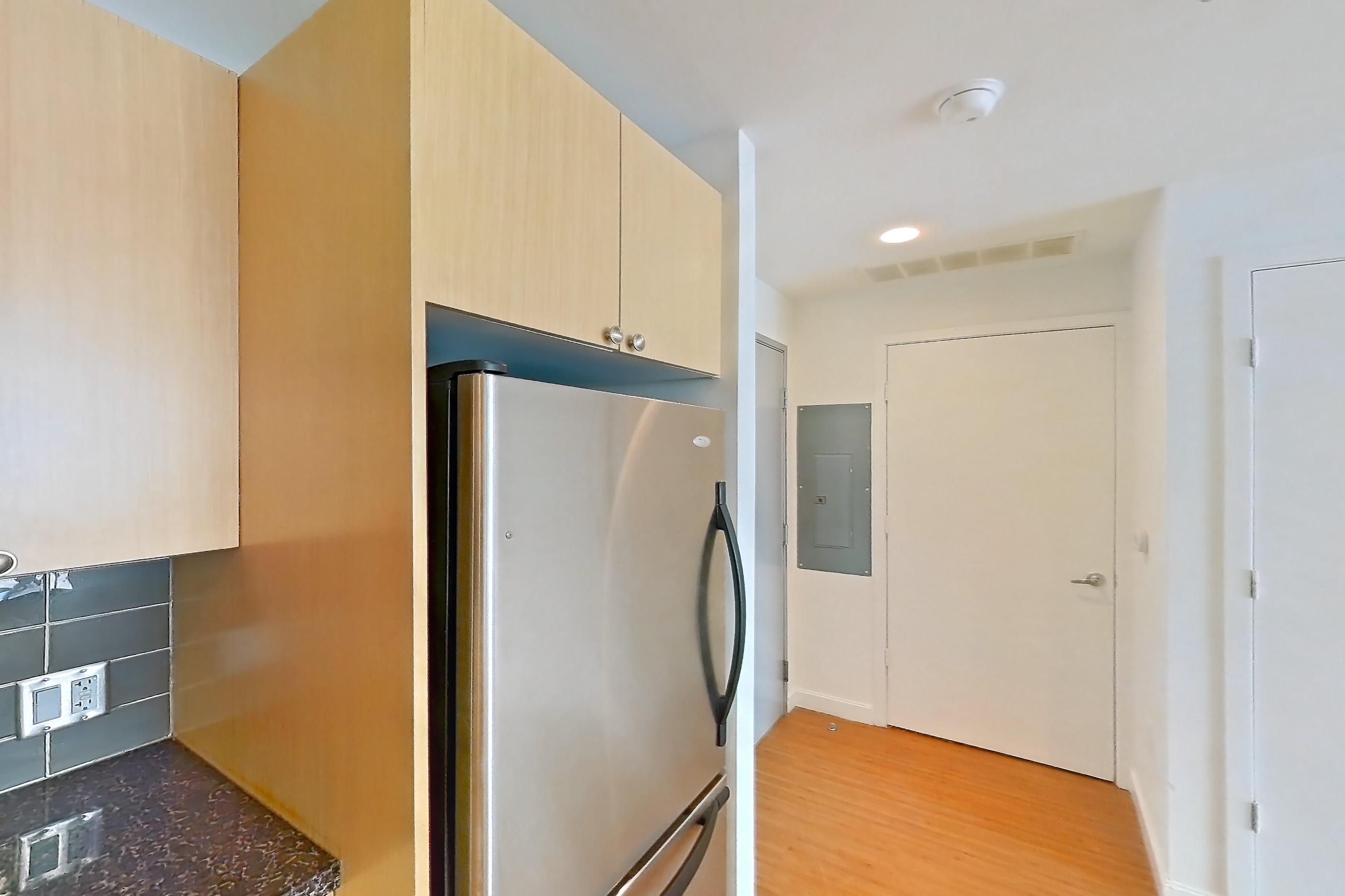 Kitchen in Apartment e-1354 at The Element, 1C floor plan