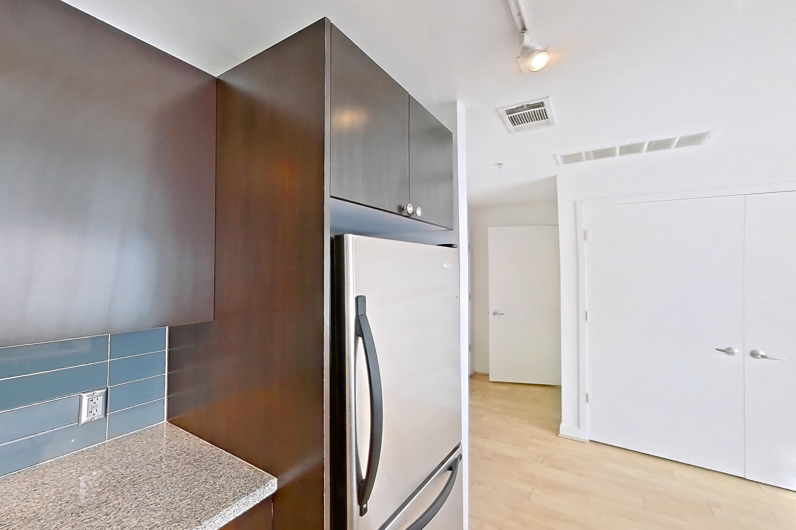 Kitchen in Apartment e-0559 at The Element, 1H floor plan