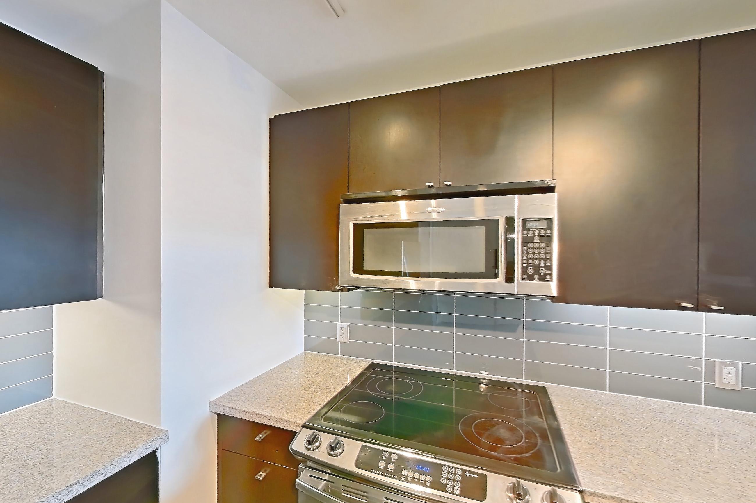 Kitchen in Apartment e-0660 at The Element, 2E floor plan