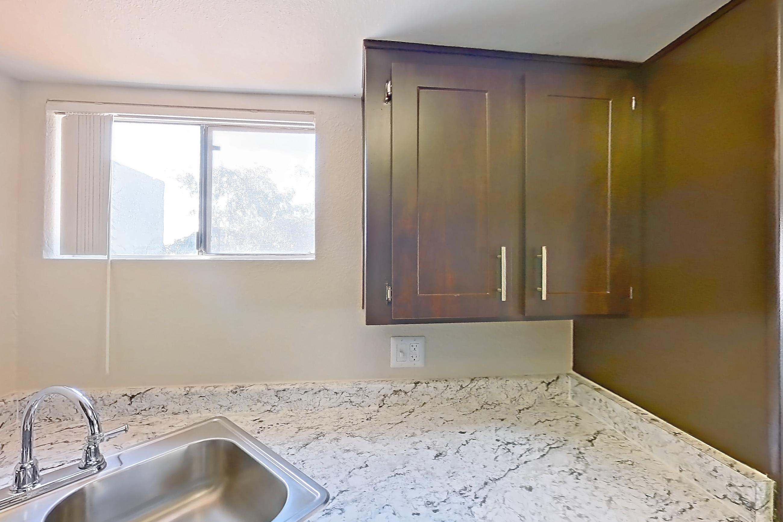 Kitchen in Apartment b-2093 at Arches at Hidden Creek, 1B floor plan