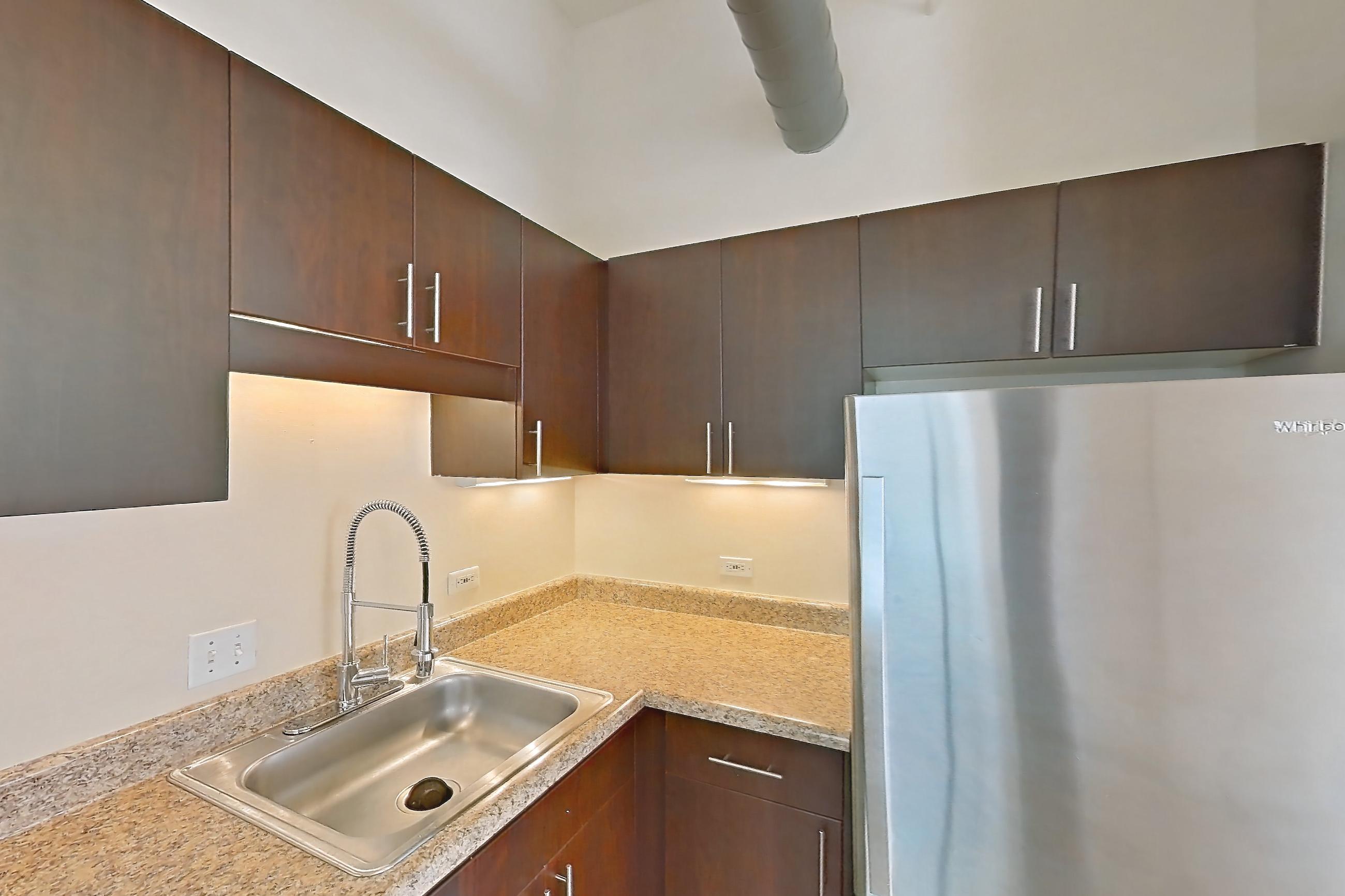 Kitchen in a 1M floor plan apartment, representative of Apartment W-0614 at The Wilson