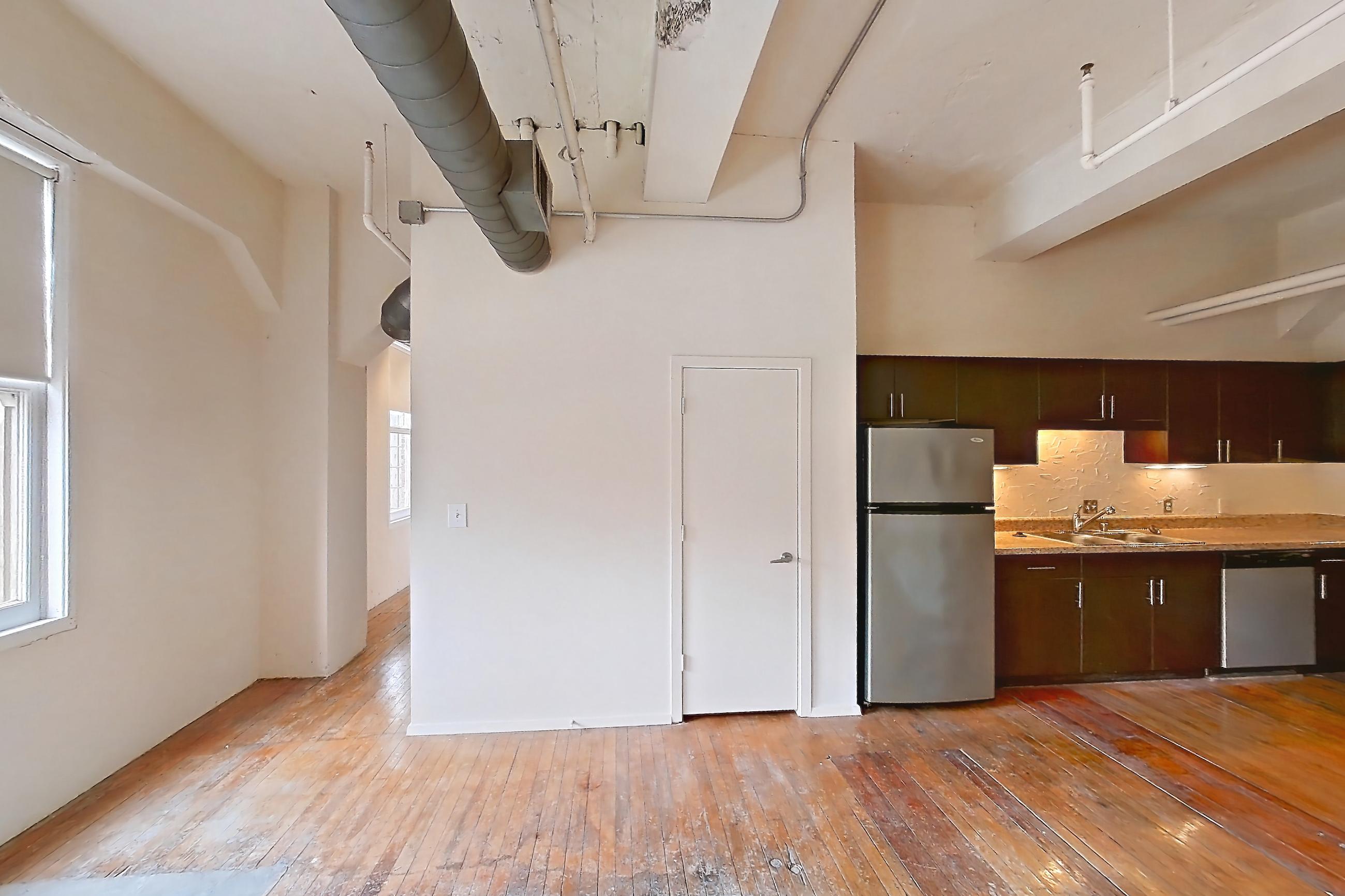 Living room in a 1U floor plan apartment, representative of Apartment W-0902 at The Wilson