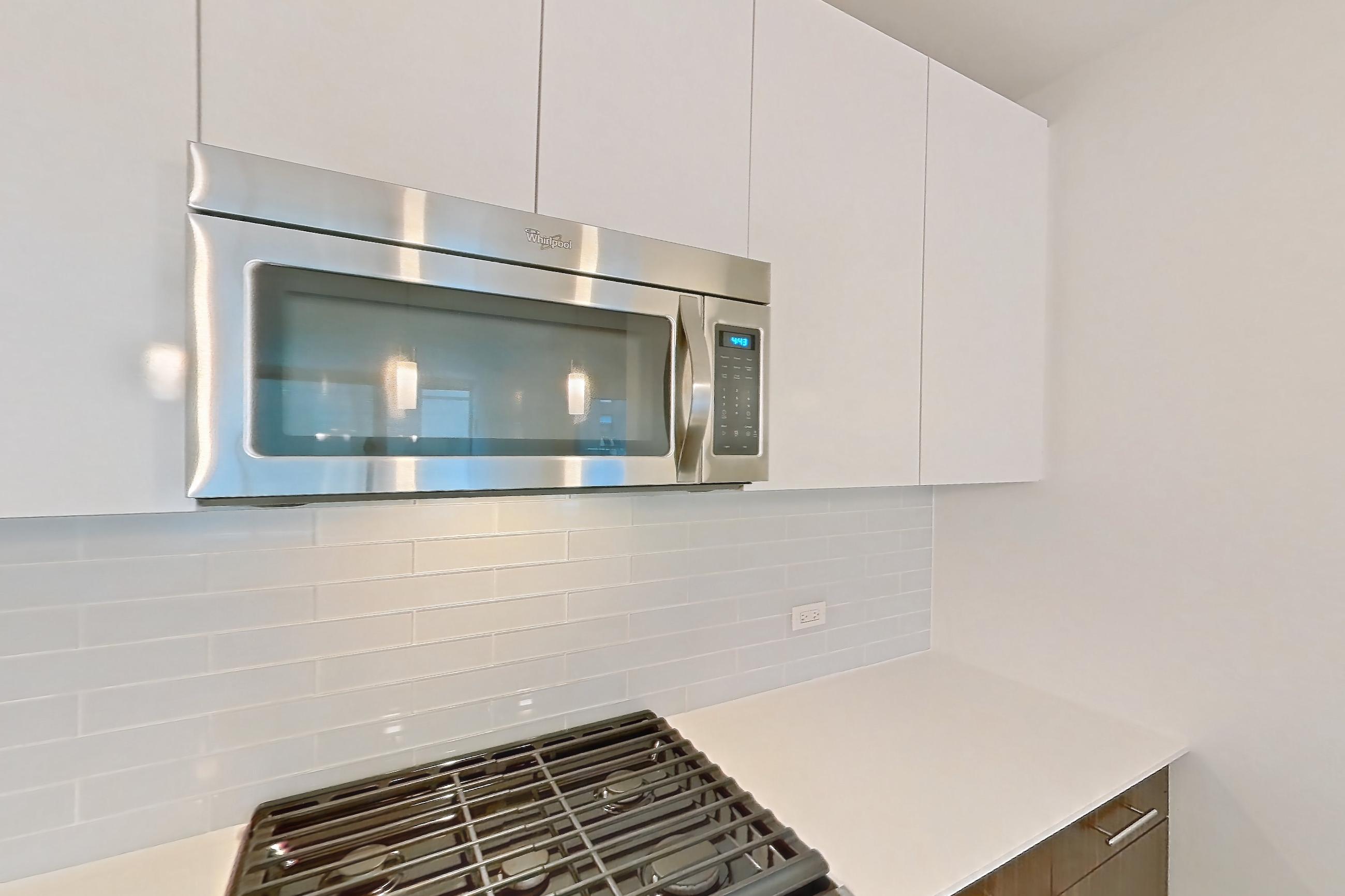Kitchen in a 1C floor plan apartment, representative of Apartment 3303 at Mila