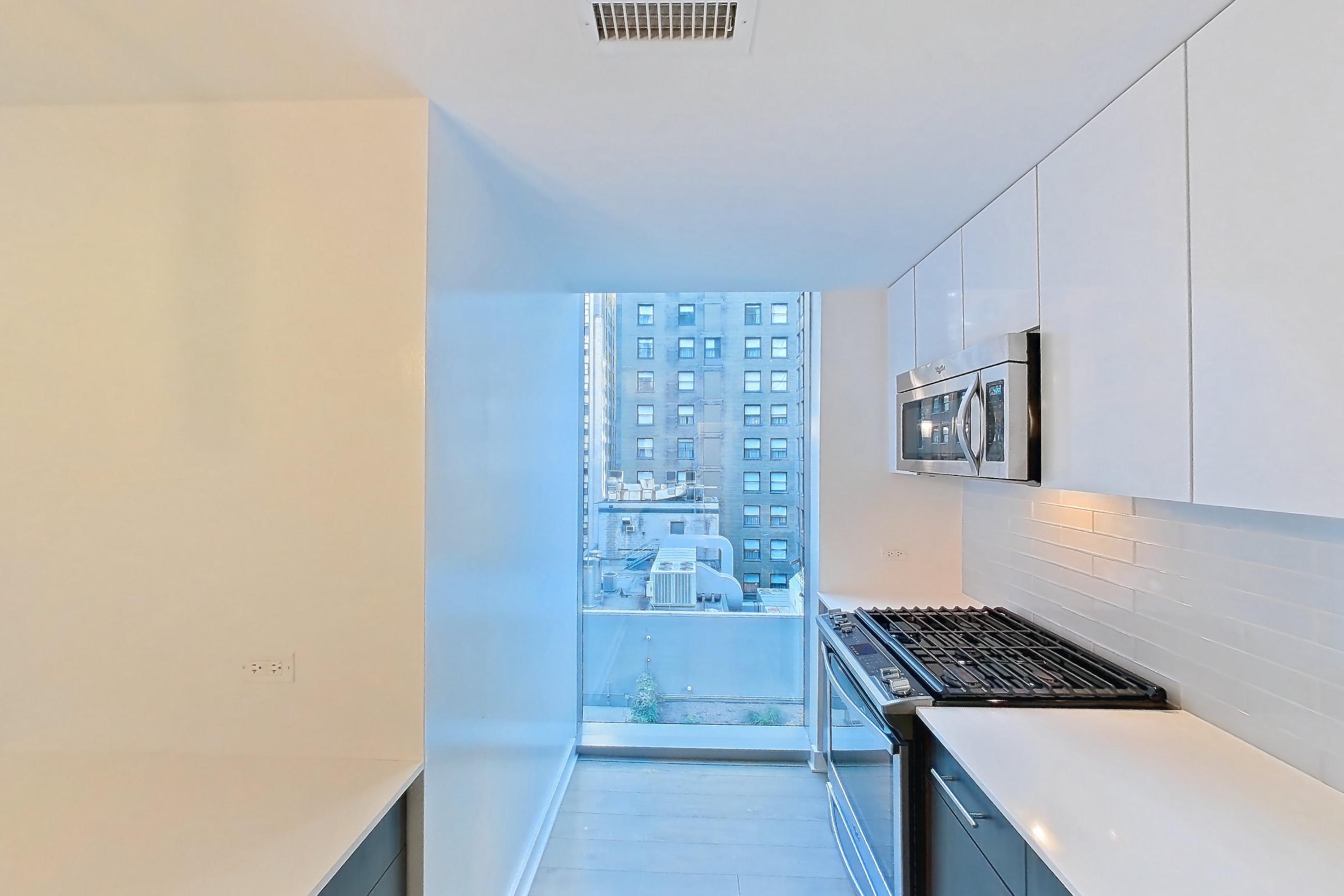 Kitchen in a 1G floor plan apartment, representative of Apartment 3901 at Mila