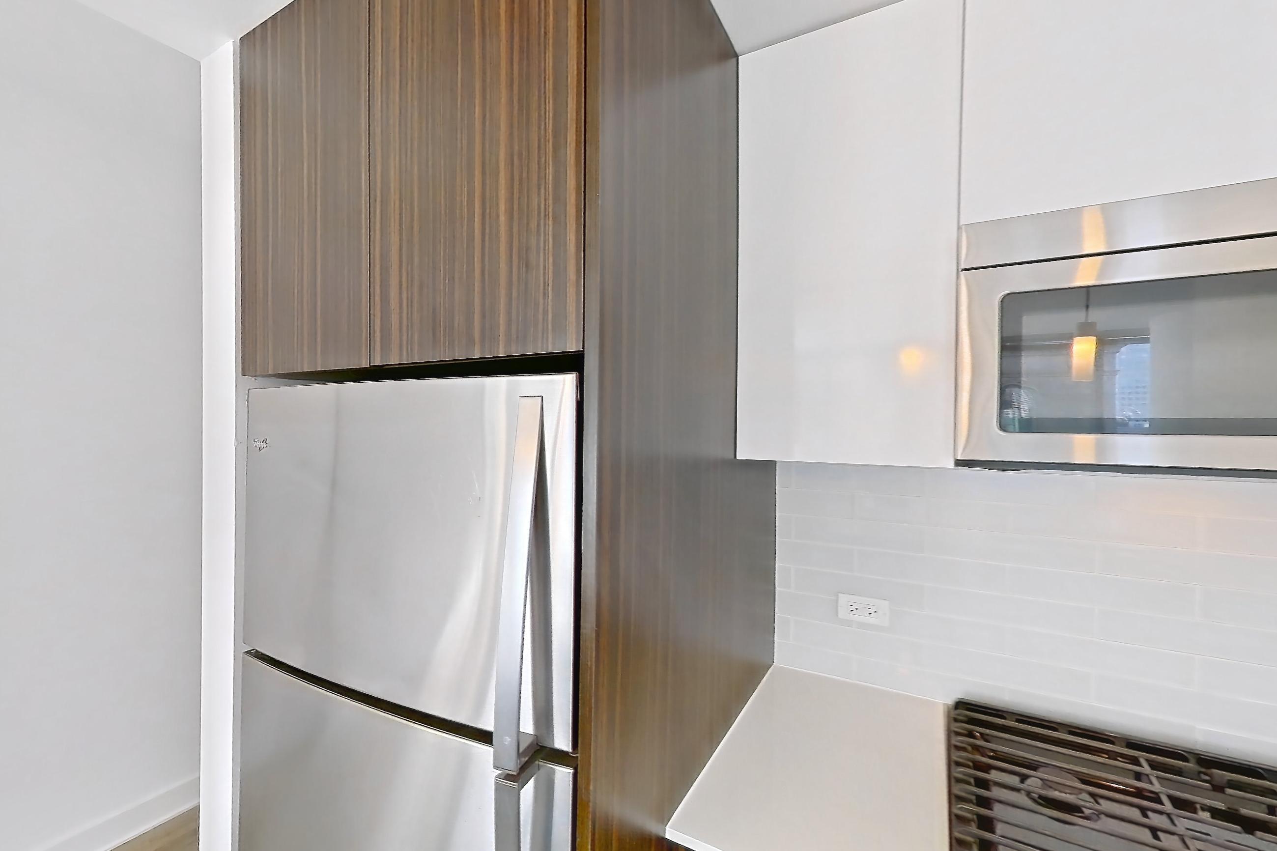 Kitchen in a 2A floor plan apartment, representative of Apartment 3307 at Mila