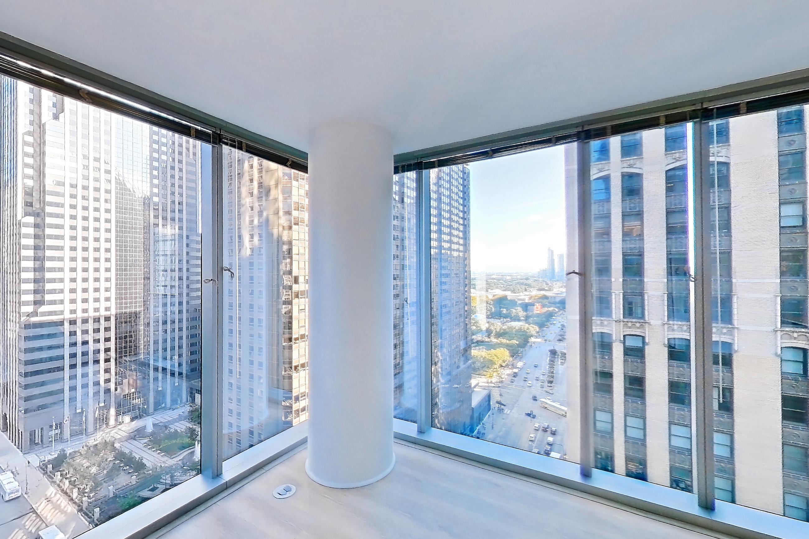 Living room with city view, Apartment 2207 at Mila