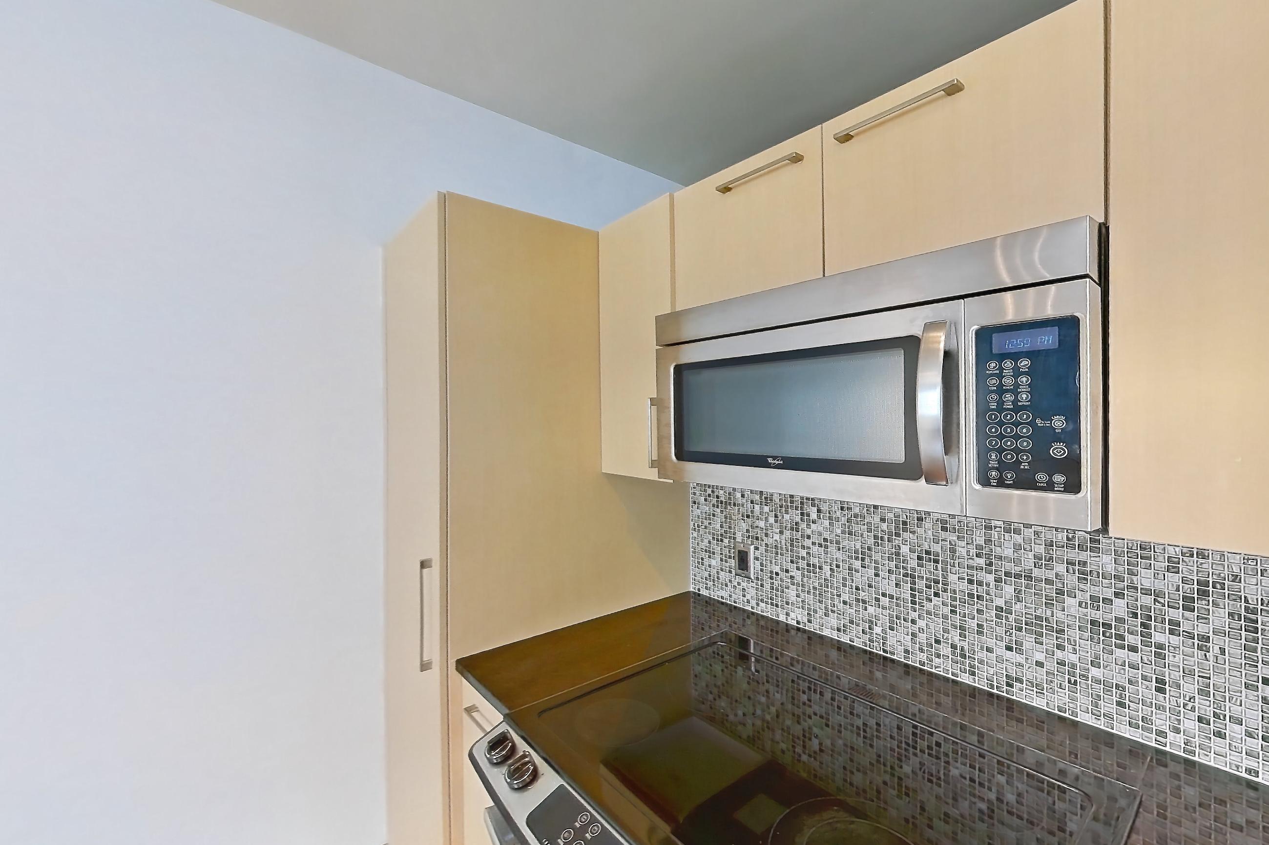 Kitchen in a 1F floor plan apartment, representative of Apartment C-0807 at The Continental