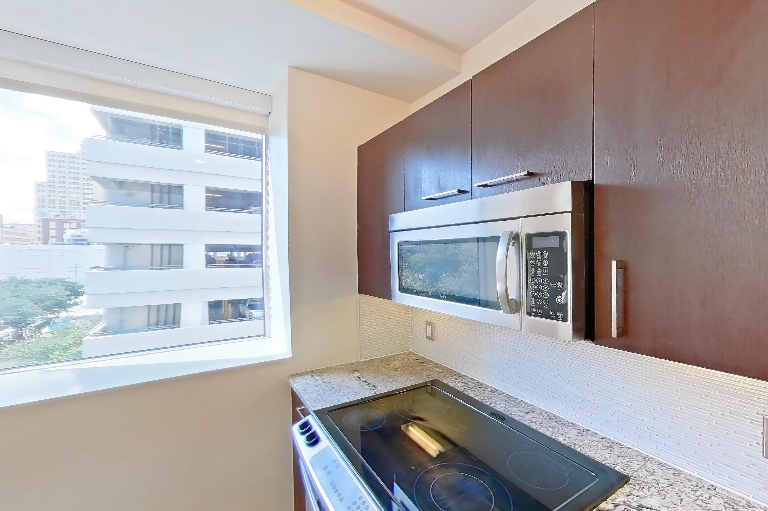 Kitchen in Apartment c-0315 at The Continental, 1S floor plan